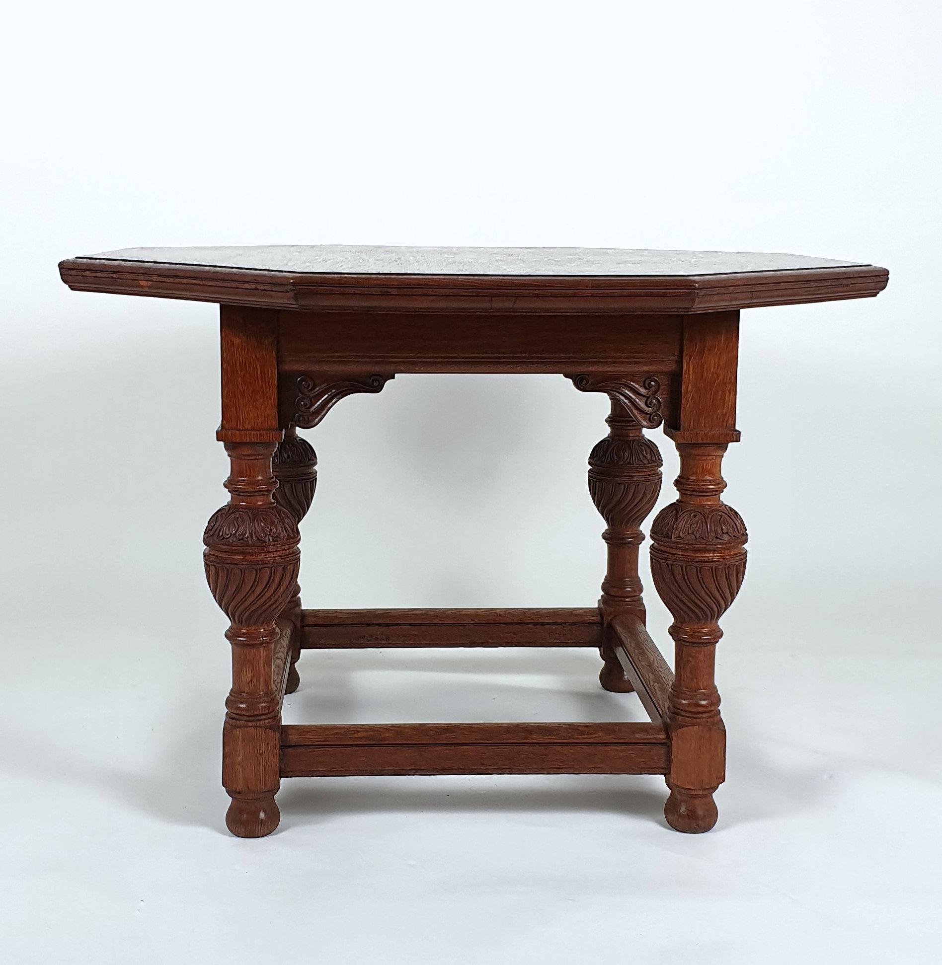 This very attractive and beautifully carved, 19th century. centre table features an octagonal shaped top with wrythen detailed supports on a square framed under tier. The table measures 41 ½ in, 105.4 cm in diameter and 28 ¾ in, 73 cm in height.
