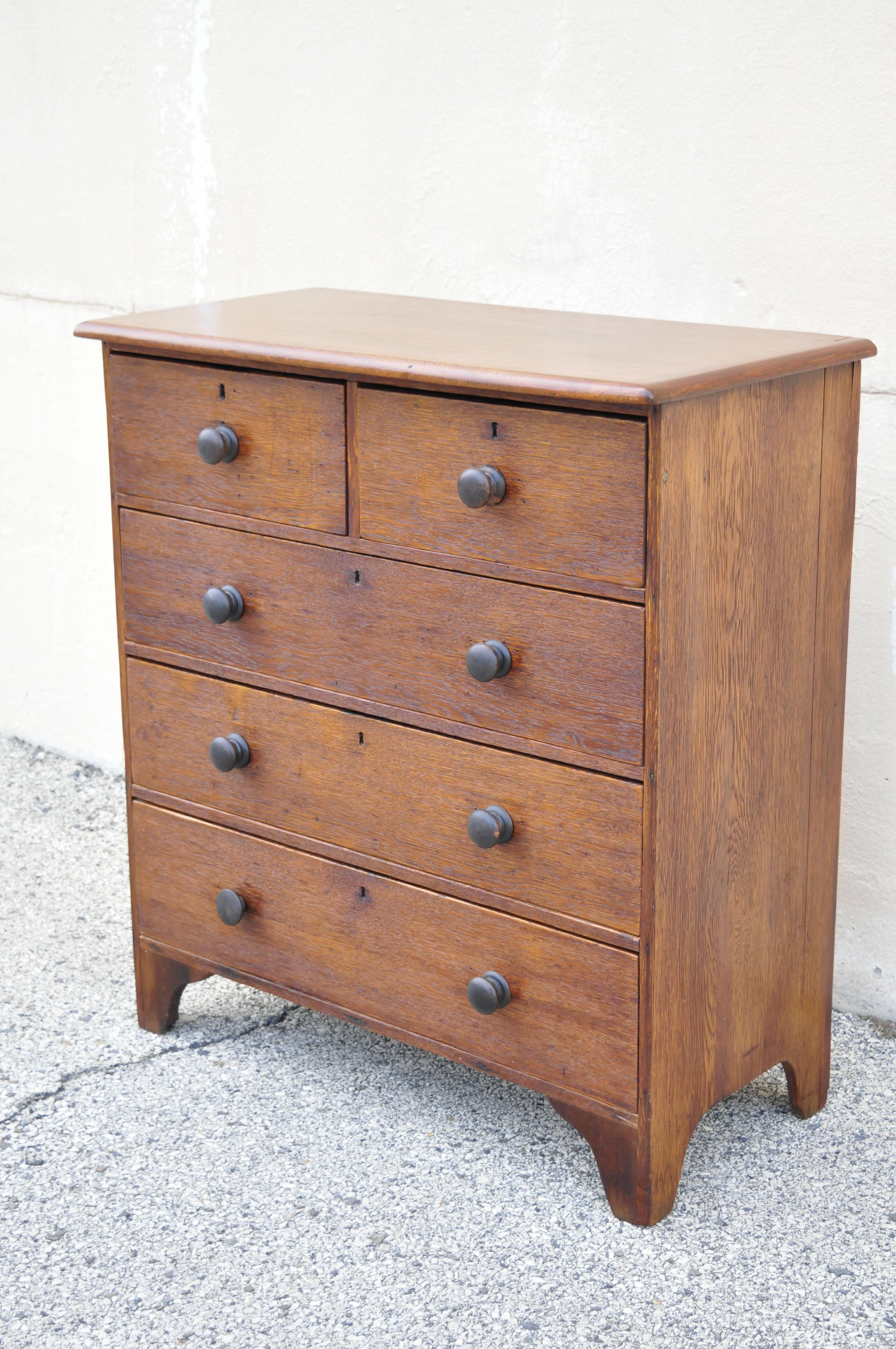 19th C. English Arts & Crafts oak wood highboy tall chest dresser. Item features solid wood construction, beautiful wood grain, no key, but unlocked, 5 dovetailed drawers, very nice antique item, quality craftsmanship, great style and form. Some