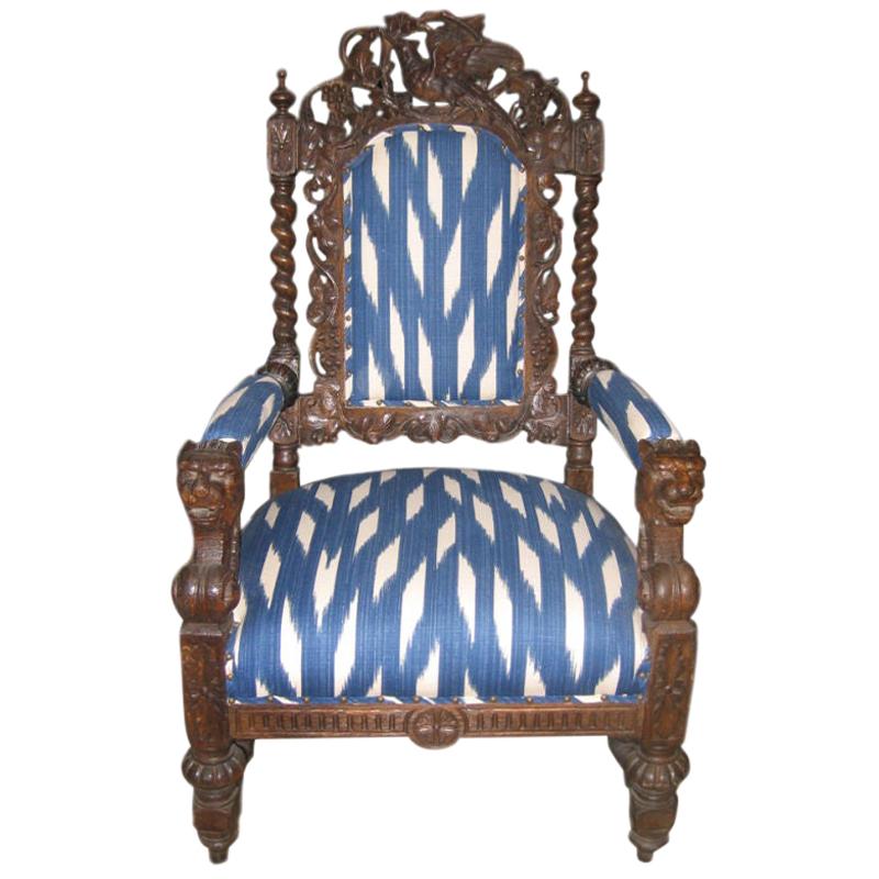19th Century English Baronial Carved Hall Armchair in Ikat Fabric For Sale
