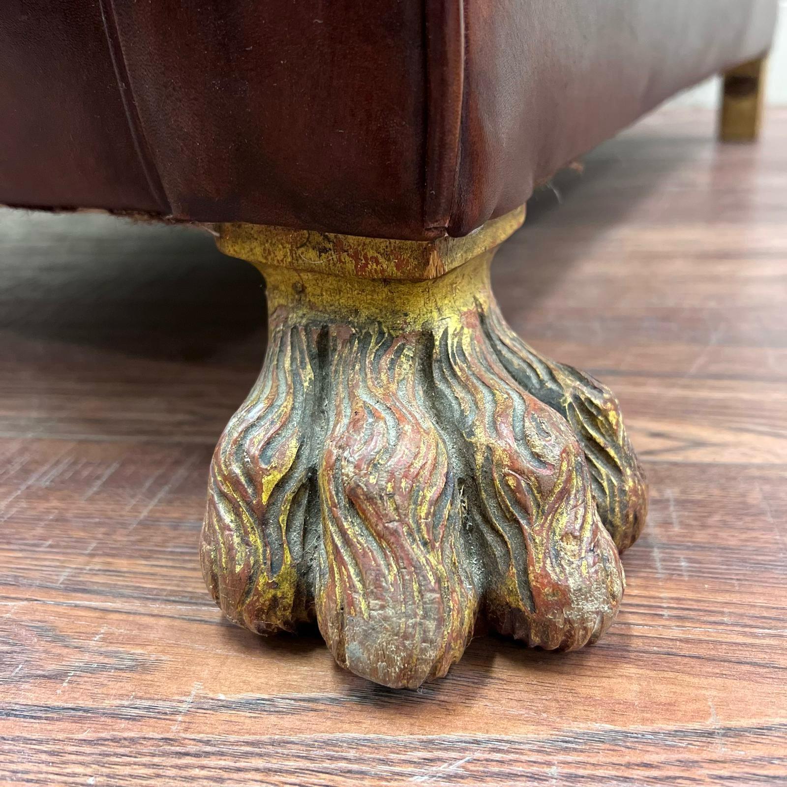 This chair has been a labour of love for some time!
Originally purchsed as a wonderfully worn, country house, deep seated arm chair. We were first attracted to the most amazing original gilt painted hairy paw feet.
We have had this fully restored
