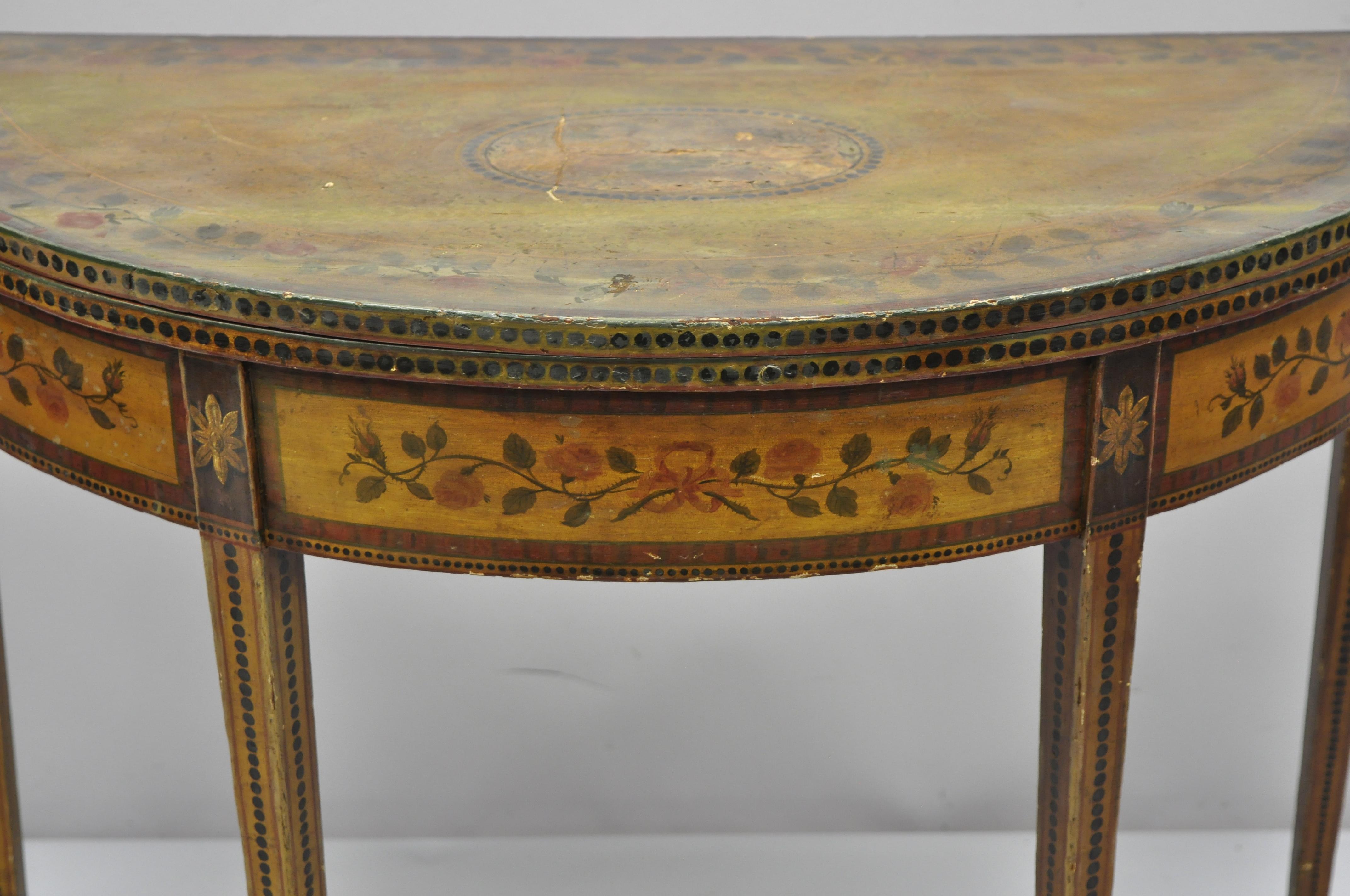19th century English Edwardian Adams style polychrome painted demilune console game table. Item features hand painted floral and 