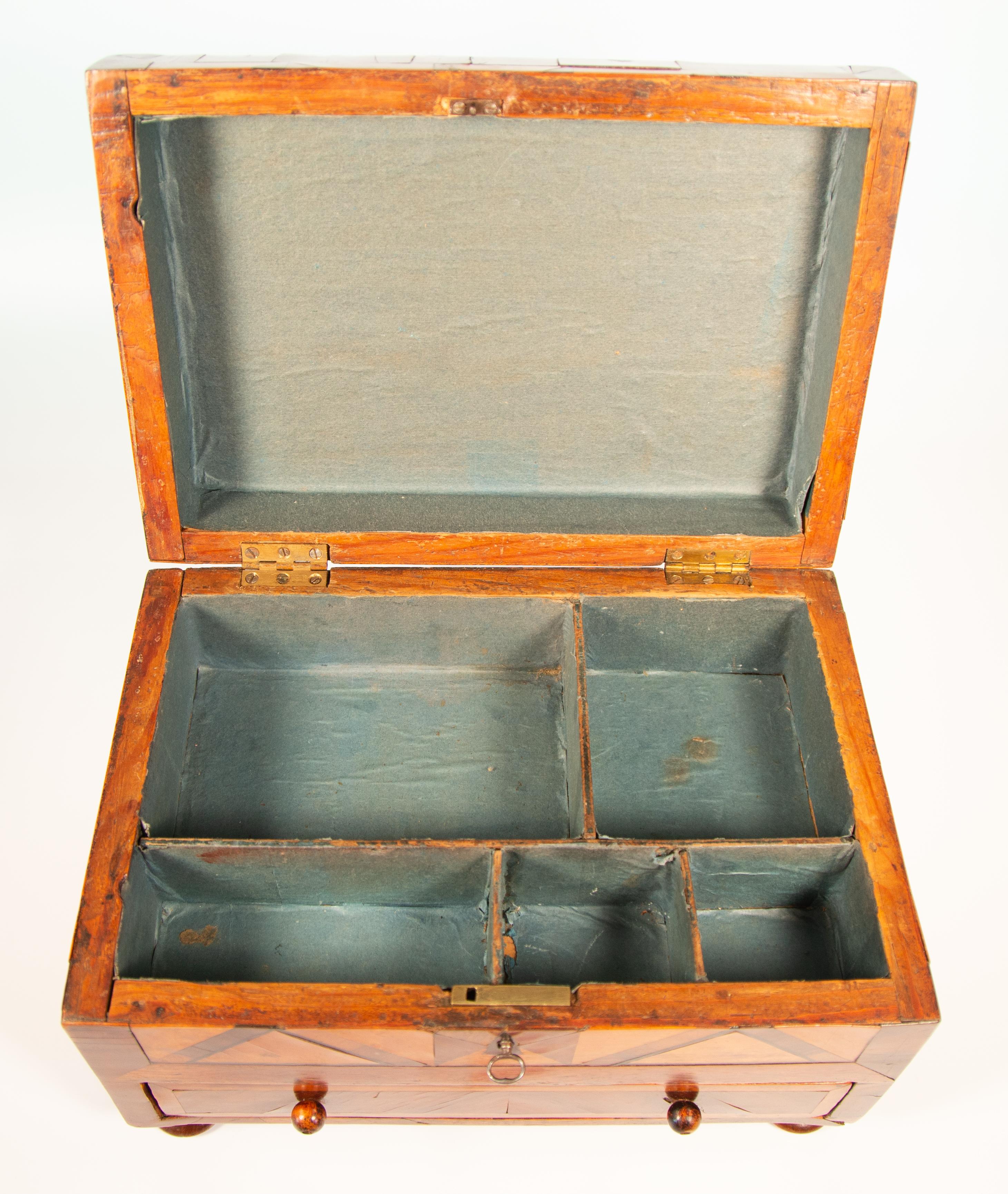 19th century English folk art work box / jewelry box circa 1860 (Mid-19th century)
Maple, birdseye maple and walnut parquetry over pine. Well made with hand cut thick applications. Has a key and working lock.
The back of the drawer pencil marked