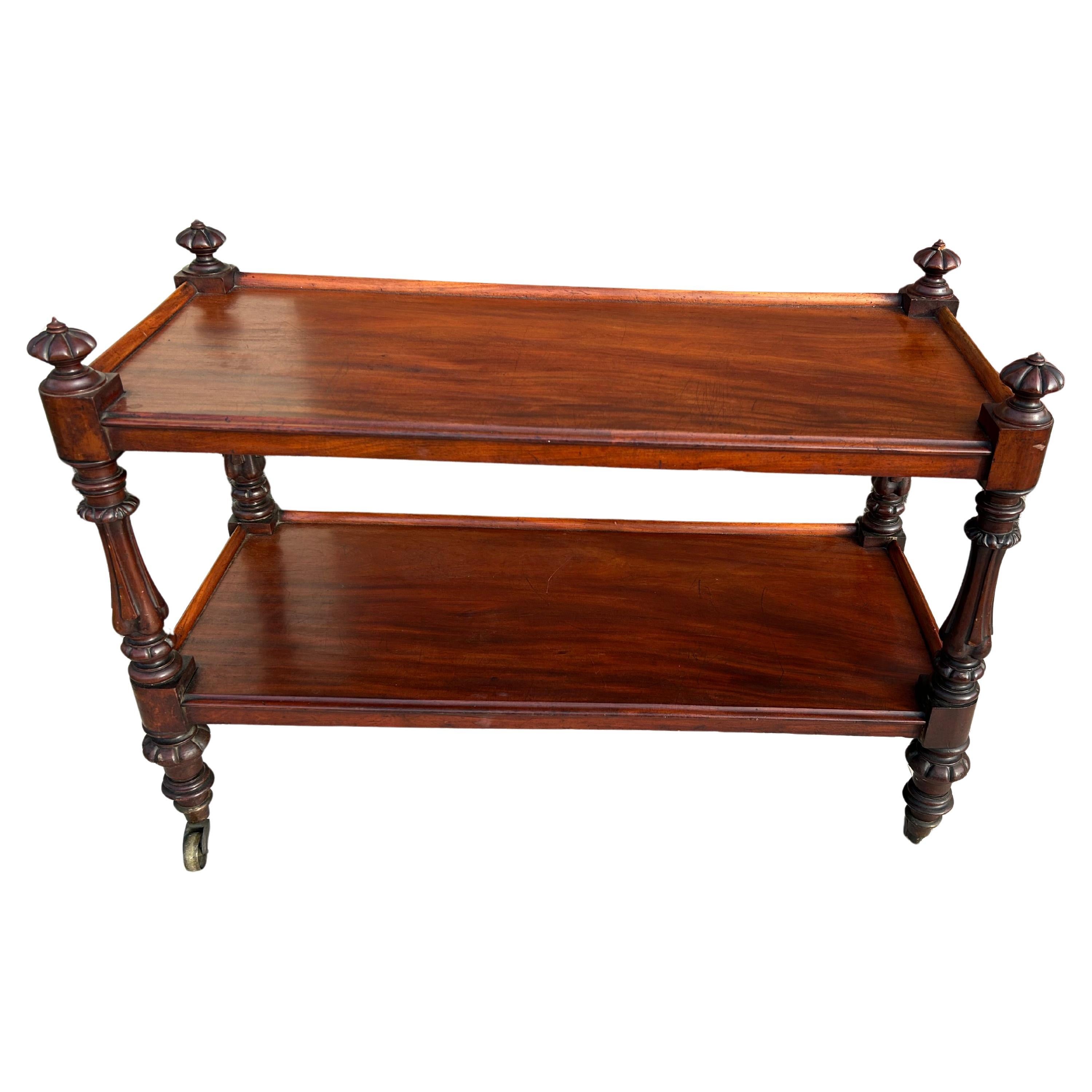 Carrello in mogano inglese del XIX secolo su rotelle in ottone con due ripiani in vendita