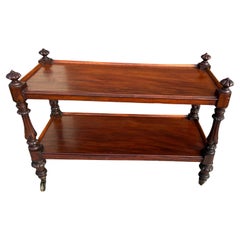 Carrello in mogano inglese del XIX secolo su rotelle in ottone con due ripiani