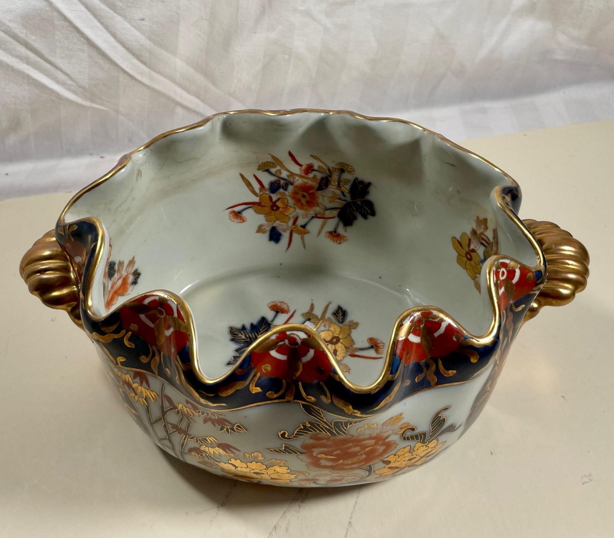 19th Century English Mason’s ironstone imari style deep blue bowl with gilt flower decoration.

Superb ironstone bowl hand painted with bold enamels of Cobalt Blue, burnt orange and strong applied gilded highlights. This bowl was made by Mason’s