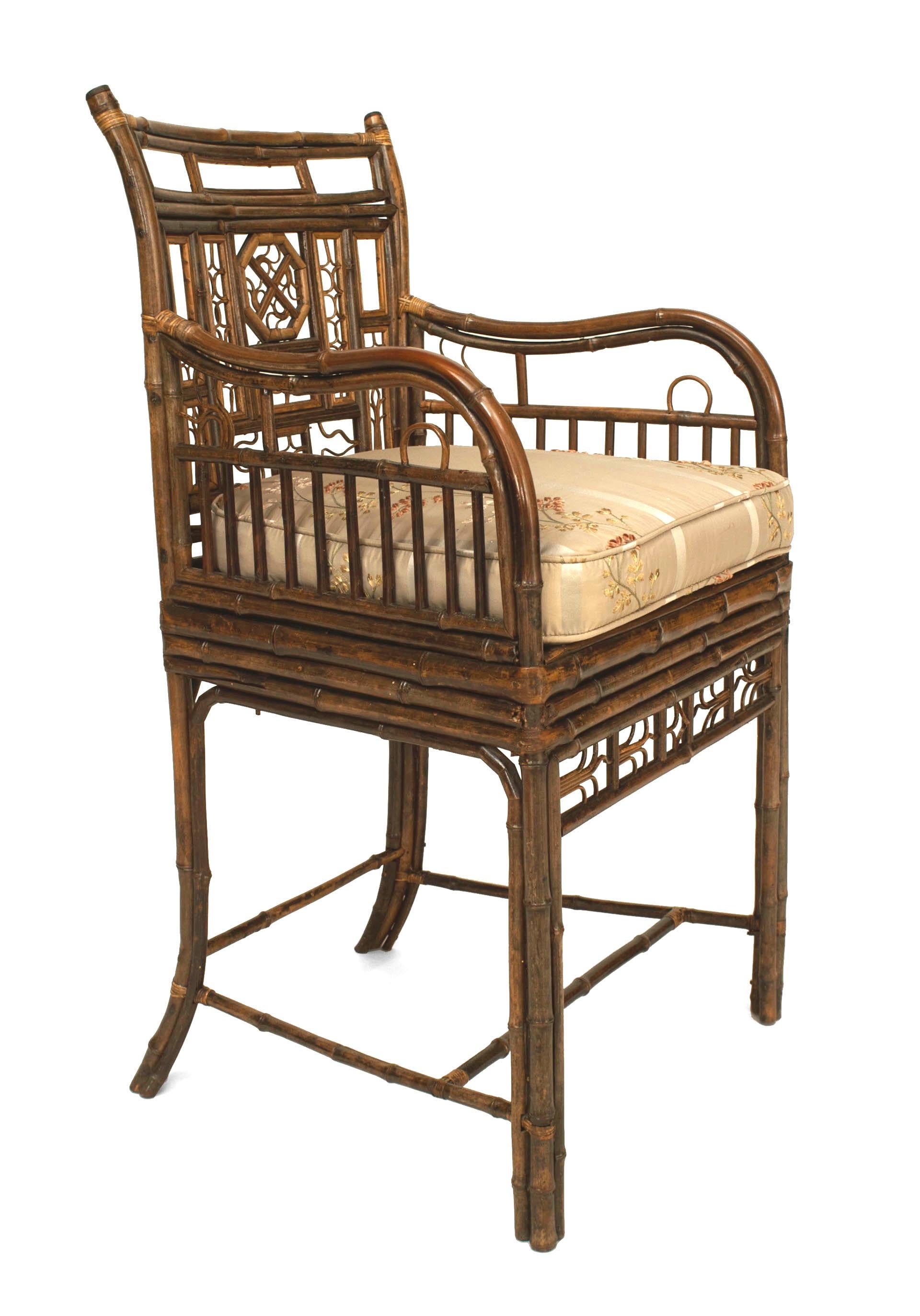 English Regency Brighton design bamboo arm chair with filigree design and a cane seat under a cushion with a stretcher (AS IS-filigree modified) (similar to Inv. #036706)
