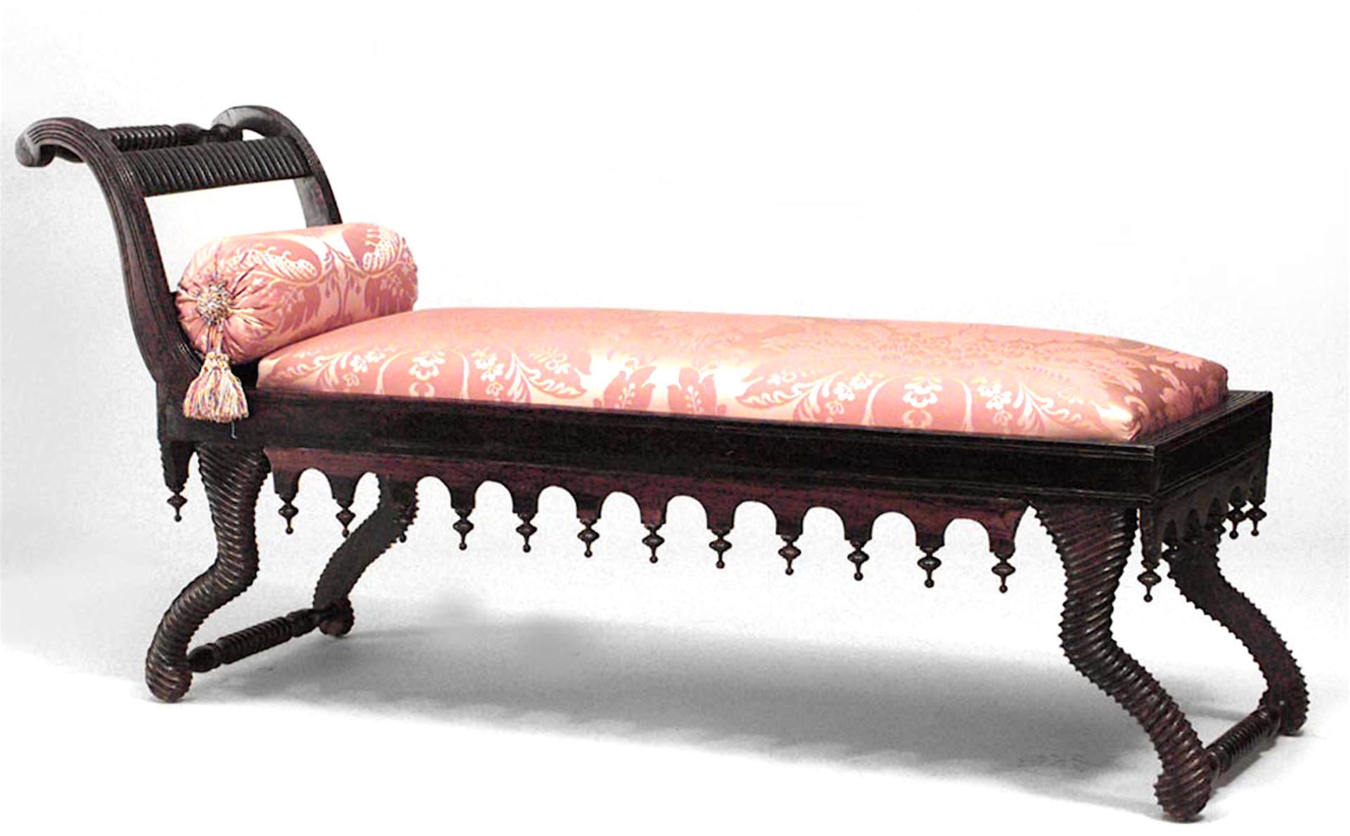 English Regency-style (19th Century) rosewood chaise with swirl and finial design with rust color upholstery.
