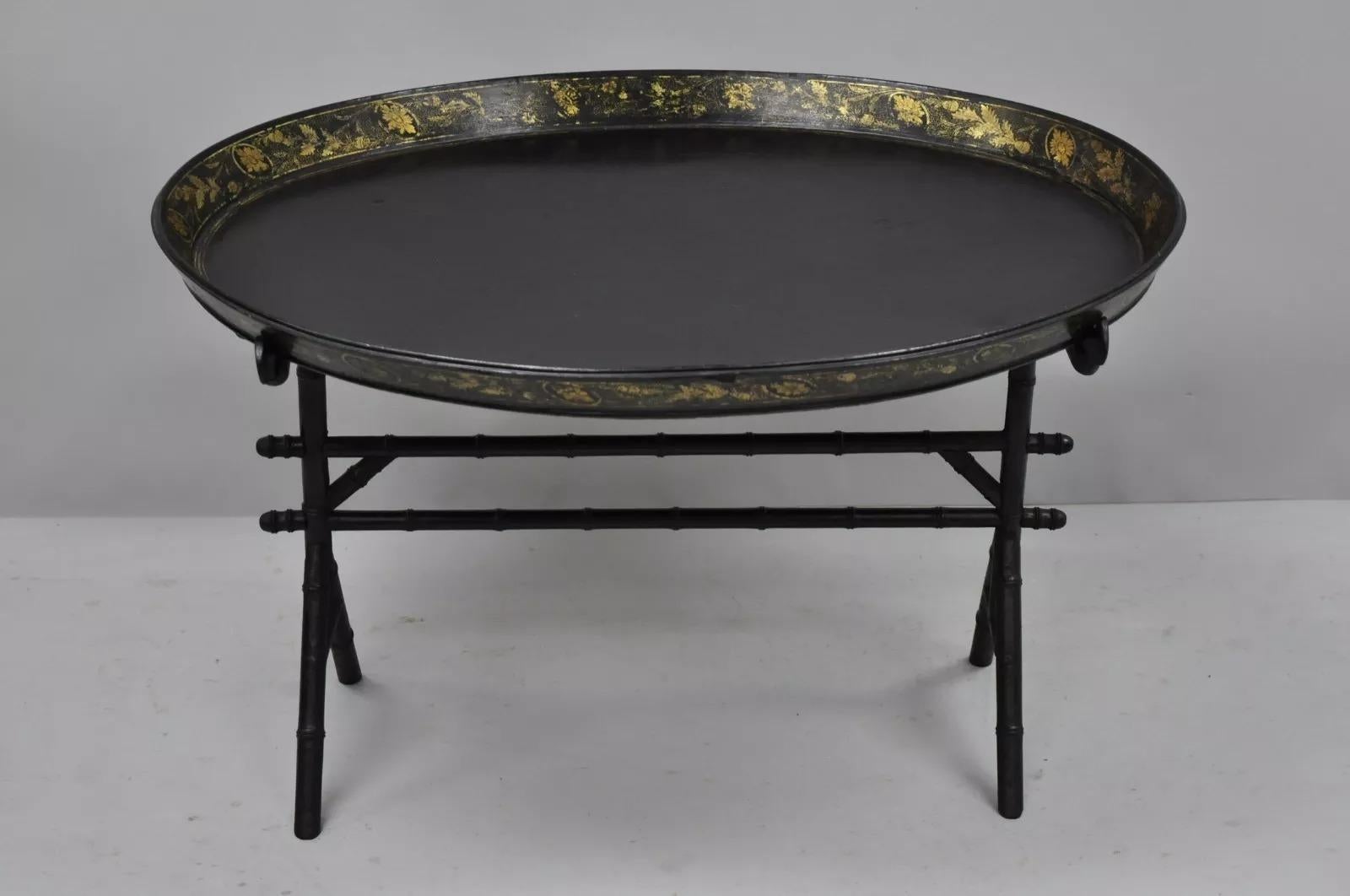 19th Century English Victorian Leather Tole Tray Coffee Table on Faux Bamboo Base. Item features gold gilt decoration to leather wrapped removable tray, faux bamboo wooden base, very nice antique item. Circa 19th Century. Measurements: 21