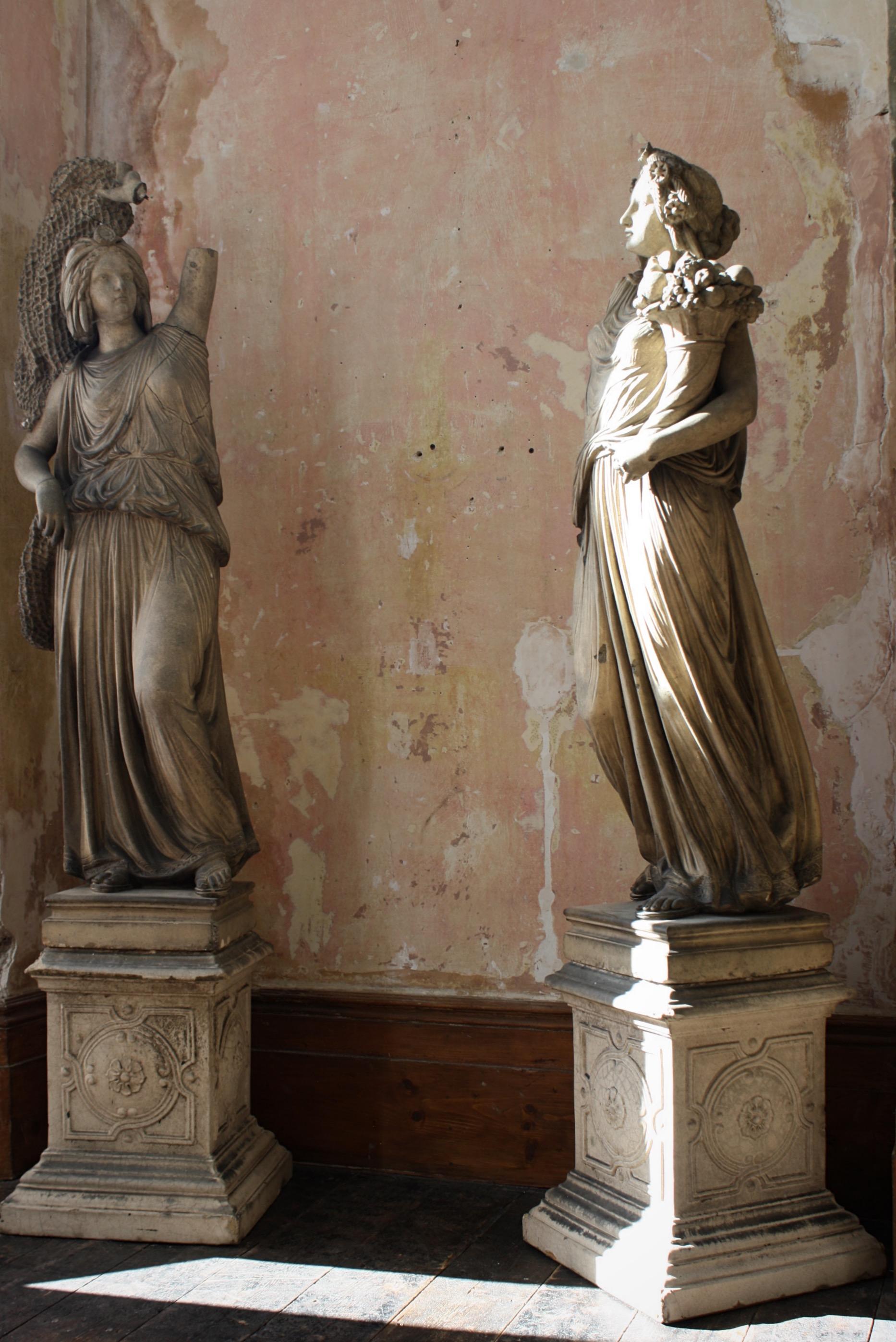 A fine pair of European terracotta classical figures by Ernst March Söhne of Berlin.

The figures depict Demeter holding a cornucopia, the other Diktynna with her fishing net, impressed marks E. MARCH SÖHNE/ CHARLOTTENBURG/ BEI BERLIN.

As you