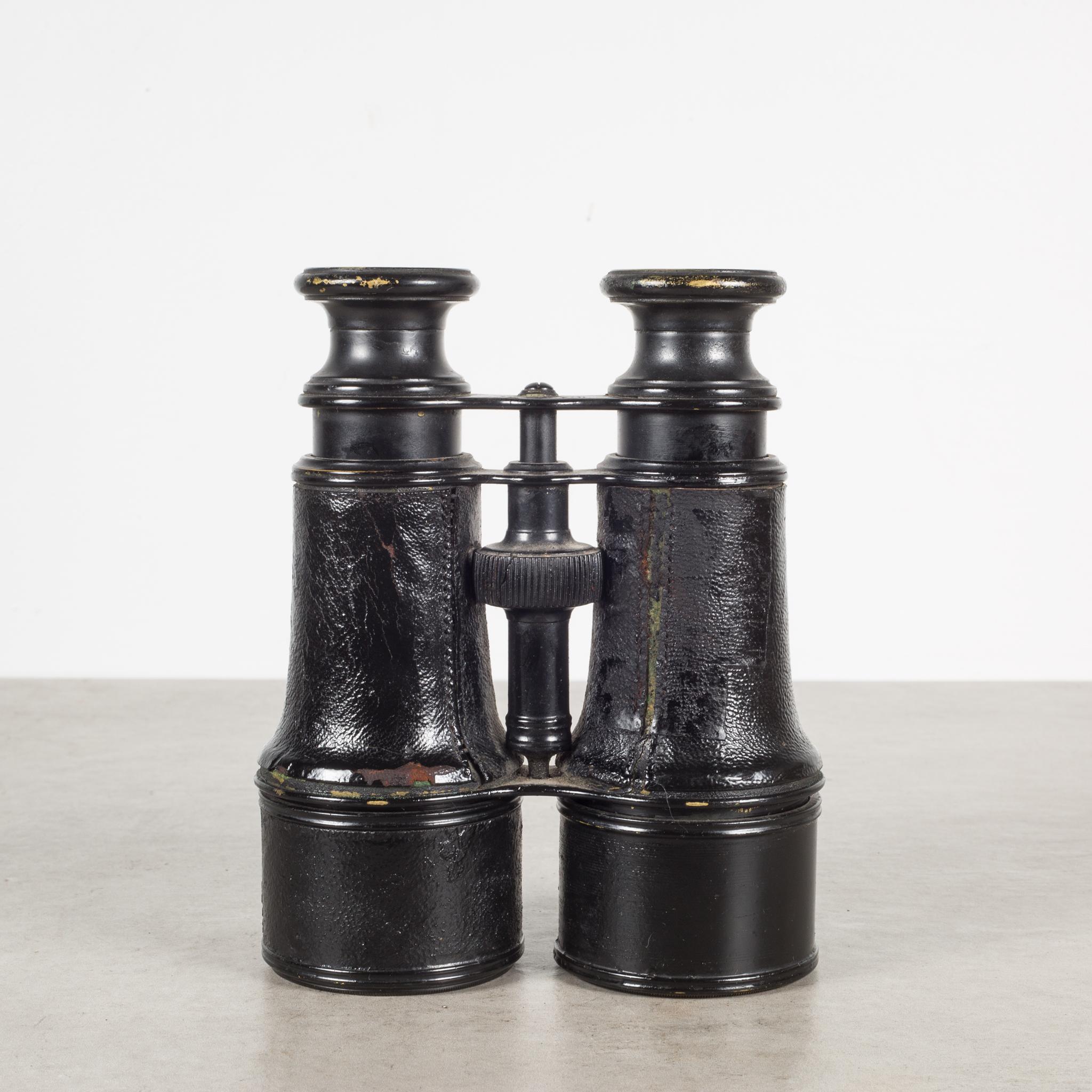 ABOUT

This is an original pair of leather wrapped expandable binoculars. 
