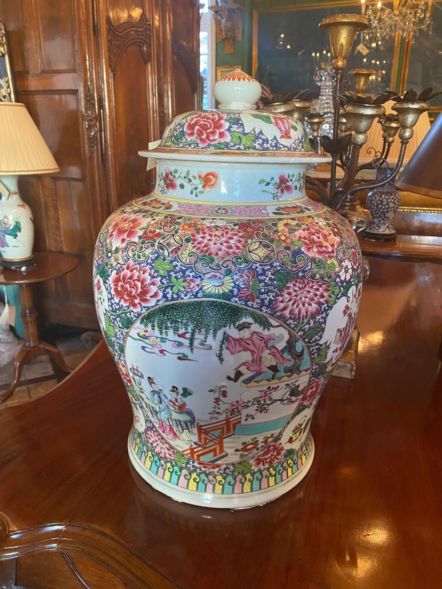 A large and impressive 19th century Baluster lidded vase urn with cover, having a finial on the lid, intricately hand painted floral panels pattern and surrounds of wisteria and chrysanthemums. Antique dealer Los Angeles Beverly hills West Hollywood