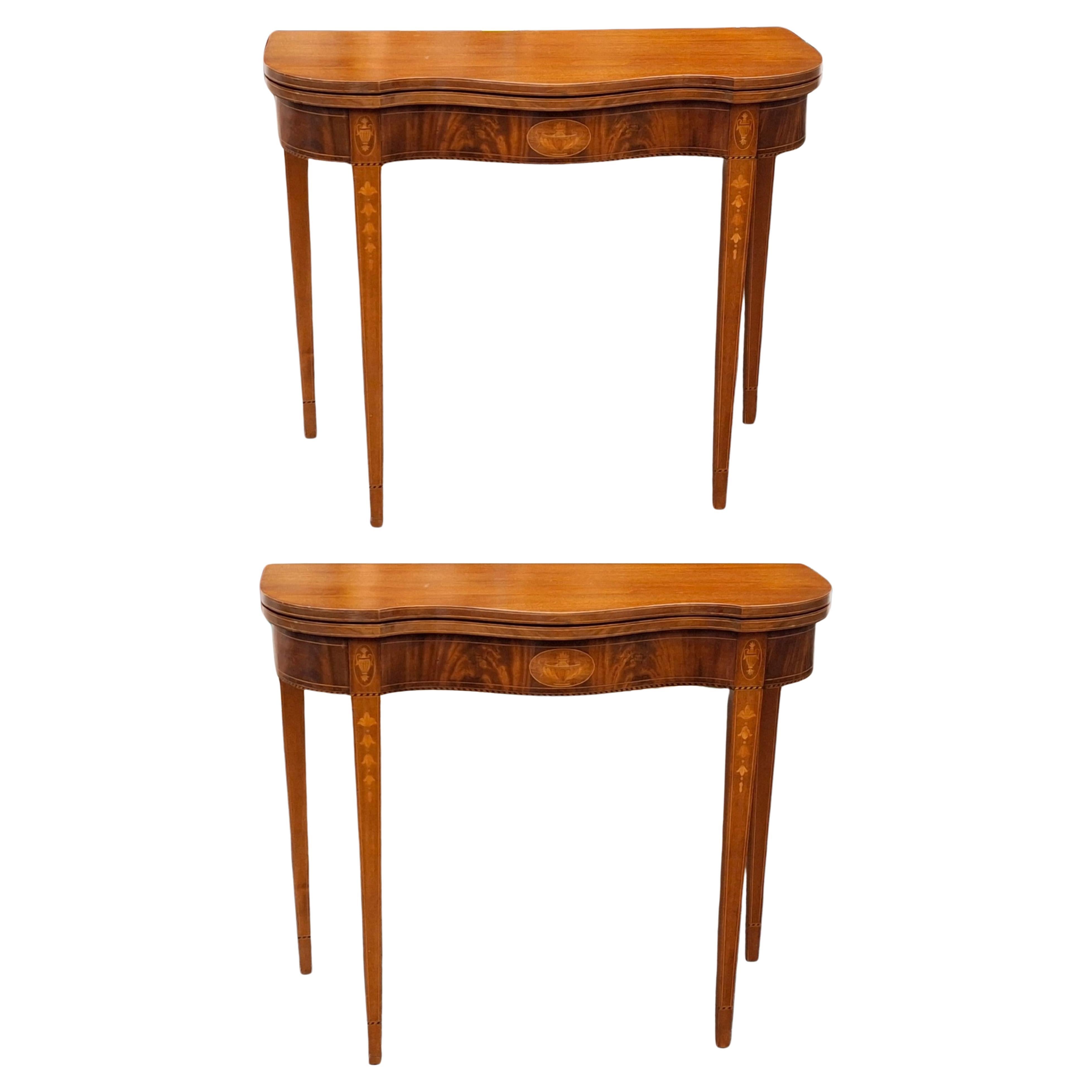 1890s Federal style satinwood inlaid flame mahogany serpentine fold top card table or console table in good antique condition. Two available. Very sturday. Measures 35.5