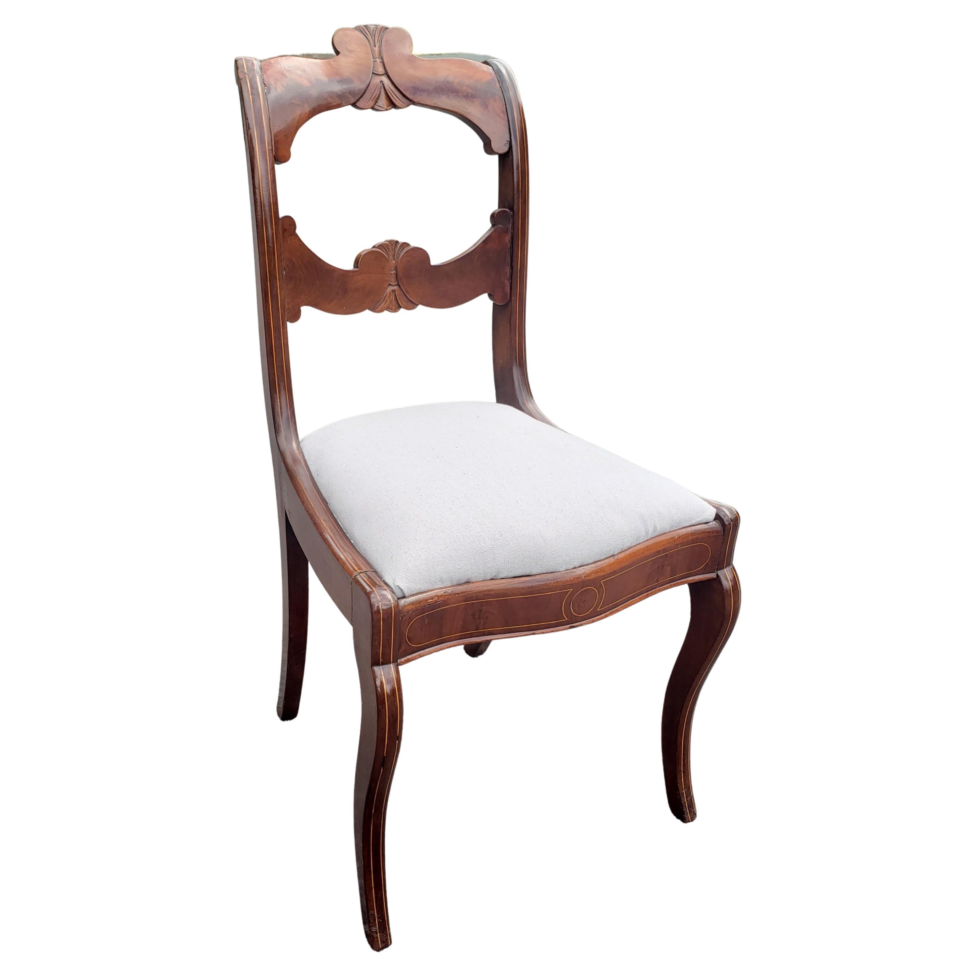 A late 19th Century Flame Mahogany and Satinwood Inlaid with Upholstered Seat Side Chair.
Measures 17.5