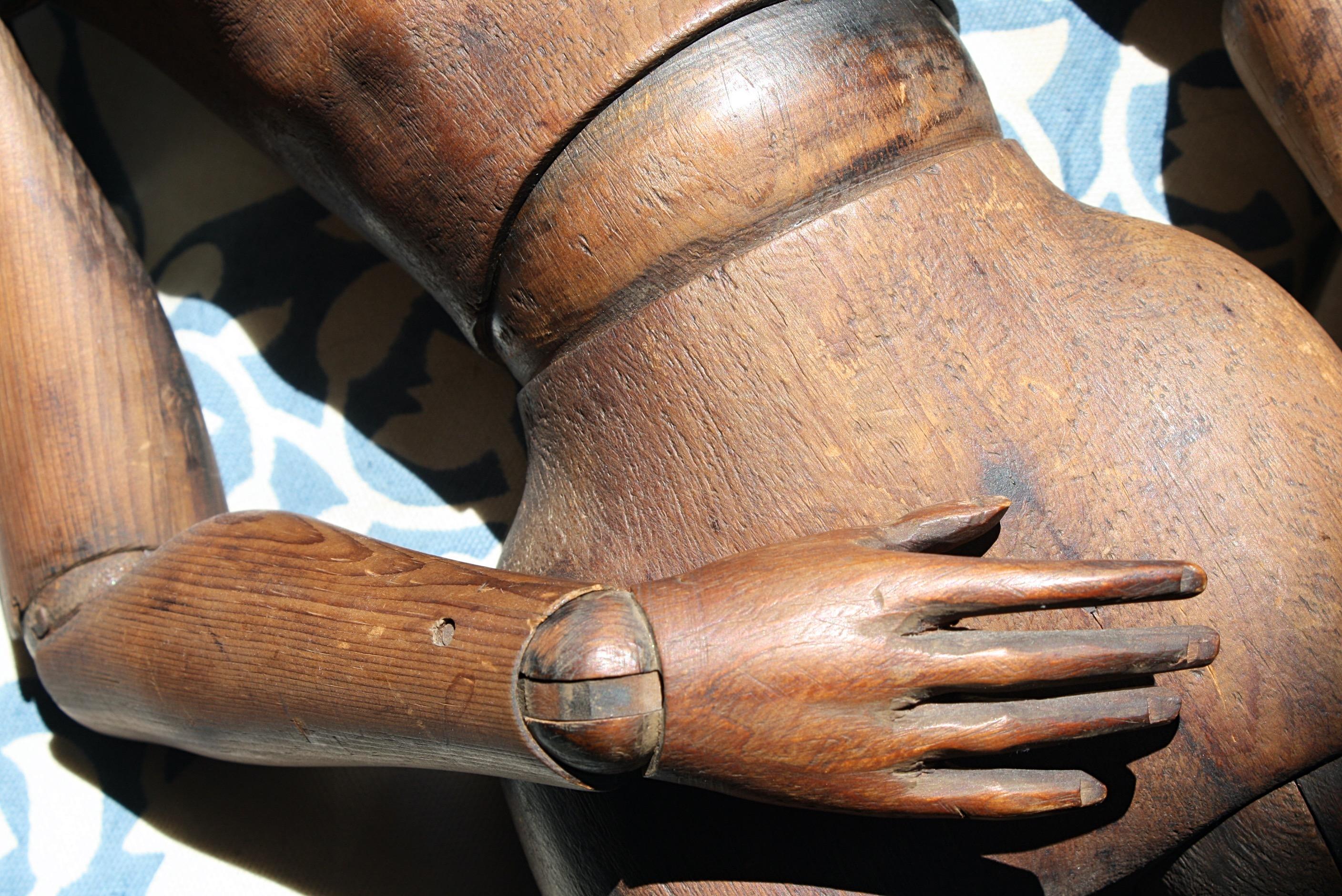 A 19th century articulated French lay figure, of pine construction with typical ball and joint limbs.

Well incised facial feature, and sculptural elongated torso rib cage.

The mannequin has an all-round good color from use, the surface is dry