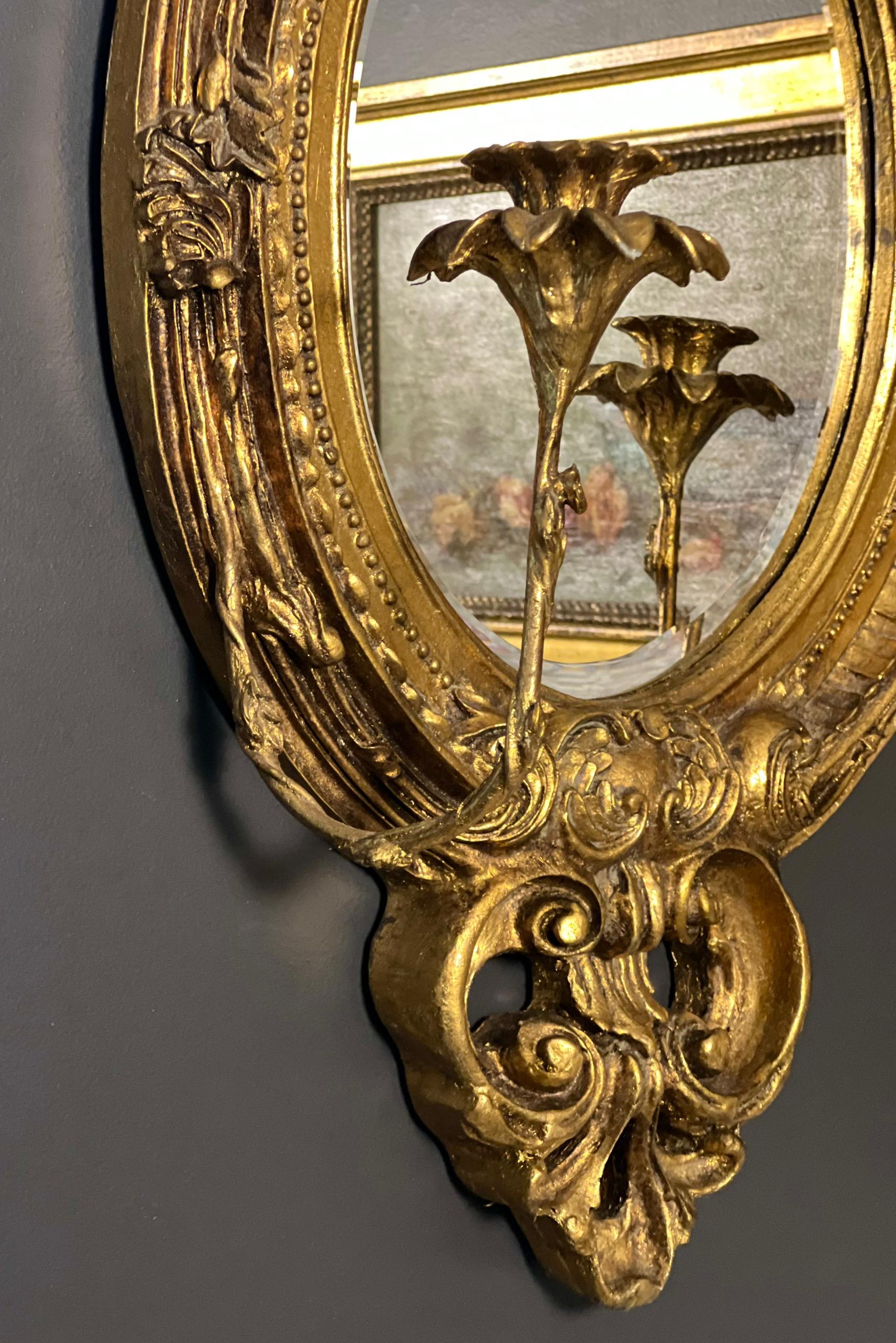 19th Century 19th C. French Baroque Carved Gilt Girandole Oval Sconce Mirror with Candelabra For Sale