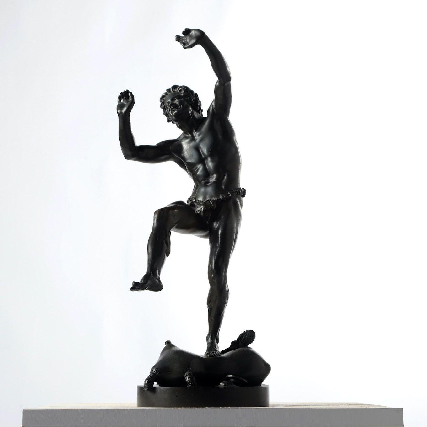 A 19th c. French bronze figure of a dancing faun by Eugène-Louis Lequesne.  Signed at the base Lequesne (1815-1887).  Dimensions:  20 inches high x 7.75 inches wide x 7 inches deep.  Arm width is 6.5 inches.  One of a few models made, proving out