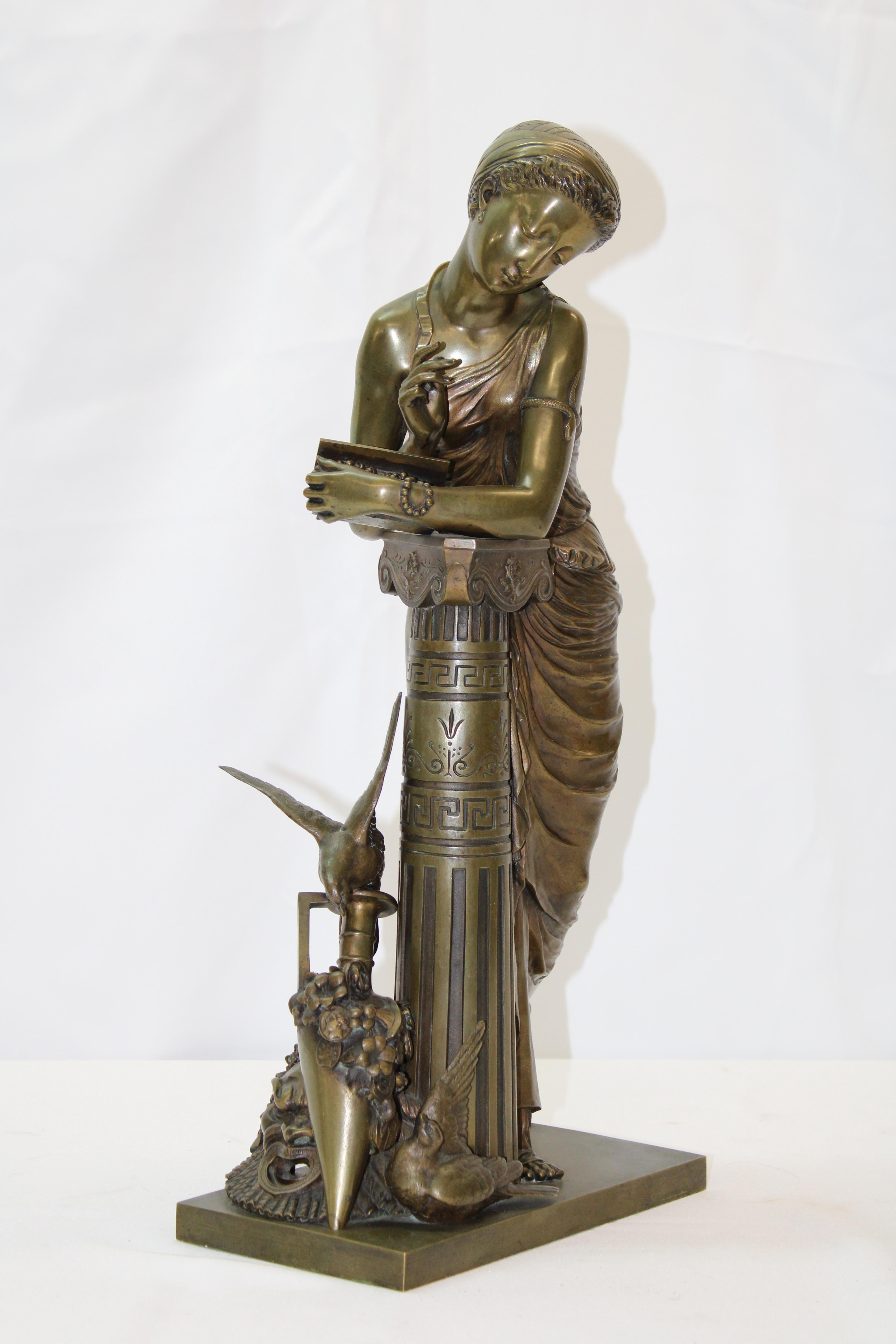 19th century French bronze woman leaning on column with embossed foundry stamp.