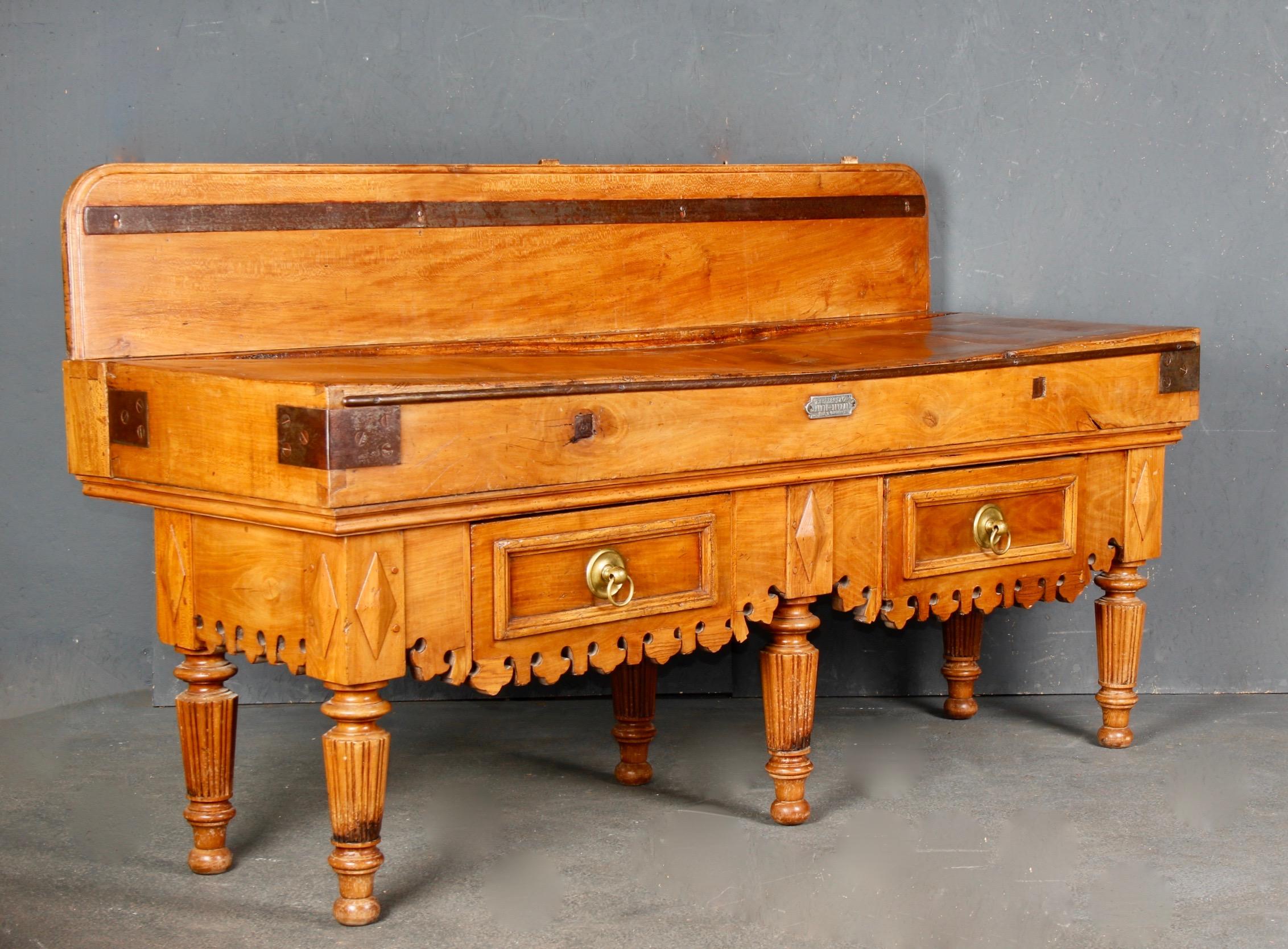 Long double Butcher Block Table, circa 1890. Large piece has three drawers and one knife slot. A fabulous, authentic 19th century French billot de boucher or butcher block, circa 1890s, handcrafted of mixed woods including maple by Trussant & Cie ,