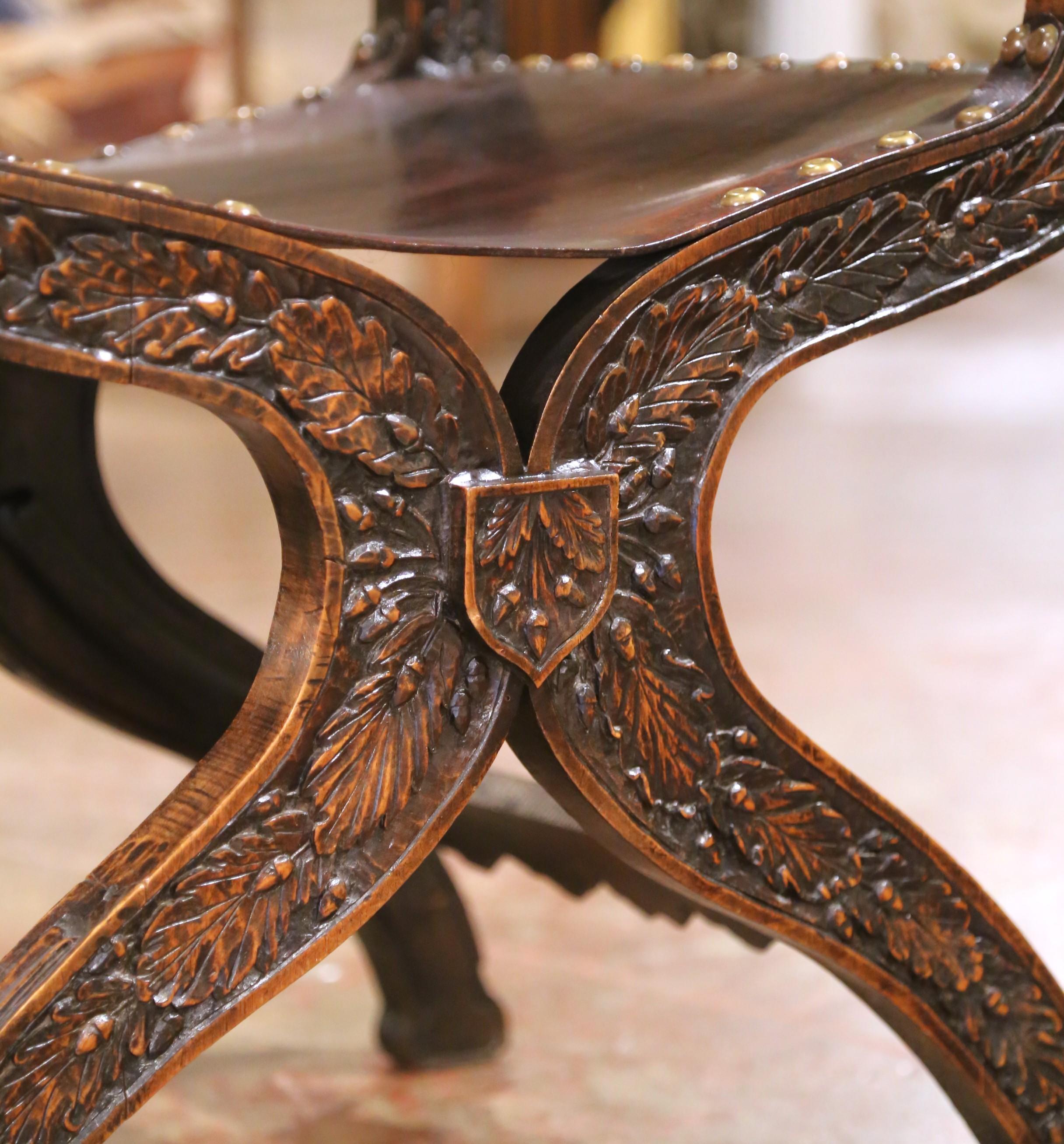 Hand-Carved 19th C. French Carved Walnut Dagobert Curule Armchair with Tooled Leather For Sale
