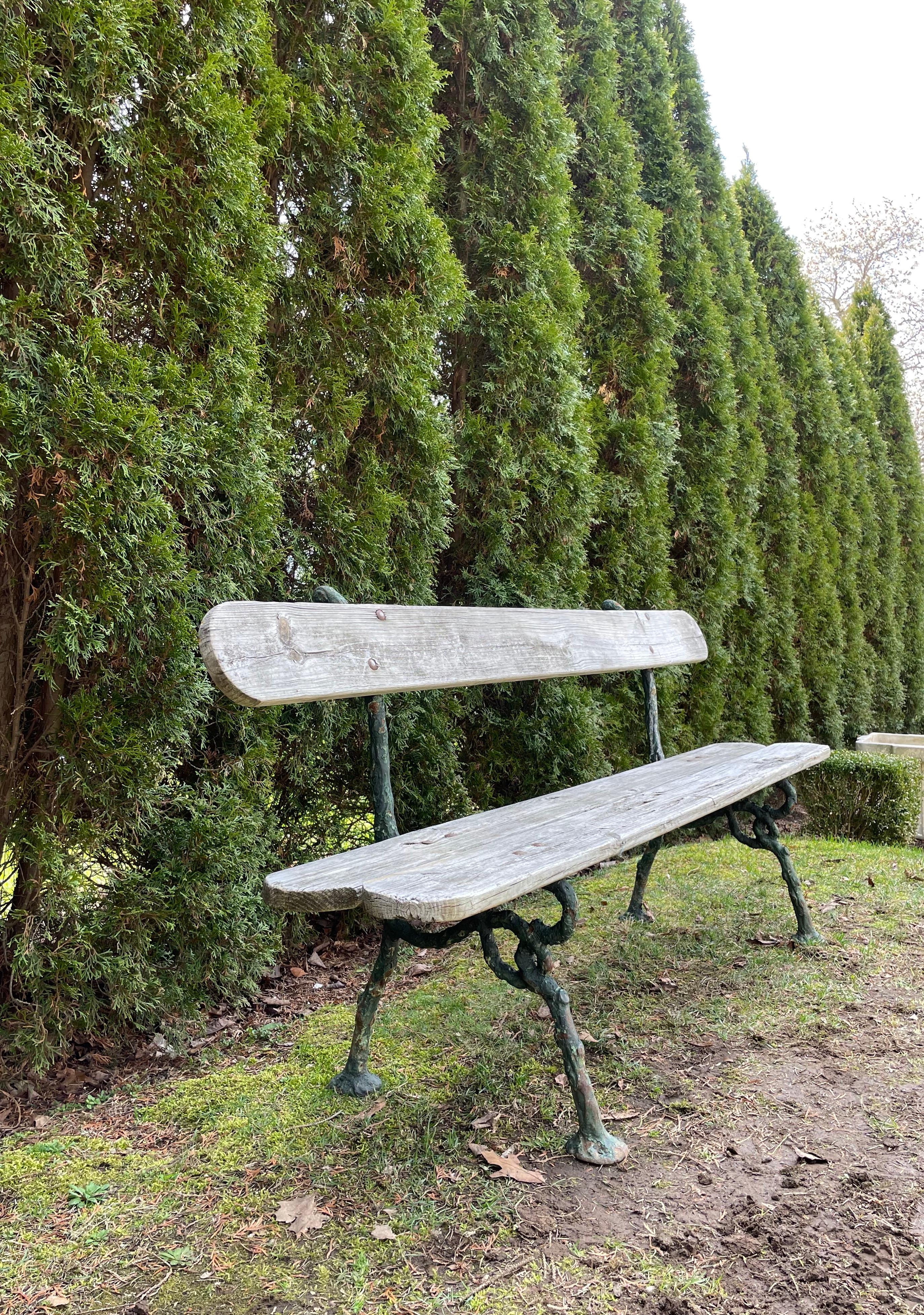 Faux Bois garden benches made of cement are more typically found in France, but we are most fortunate to have been able to source this wonderful one in cast iron. In excellent antique condition, the bench dates from the 1870s-1880s but we believe