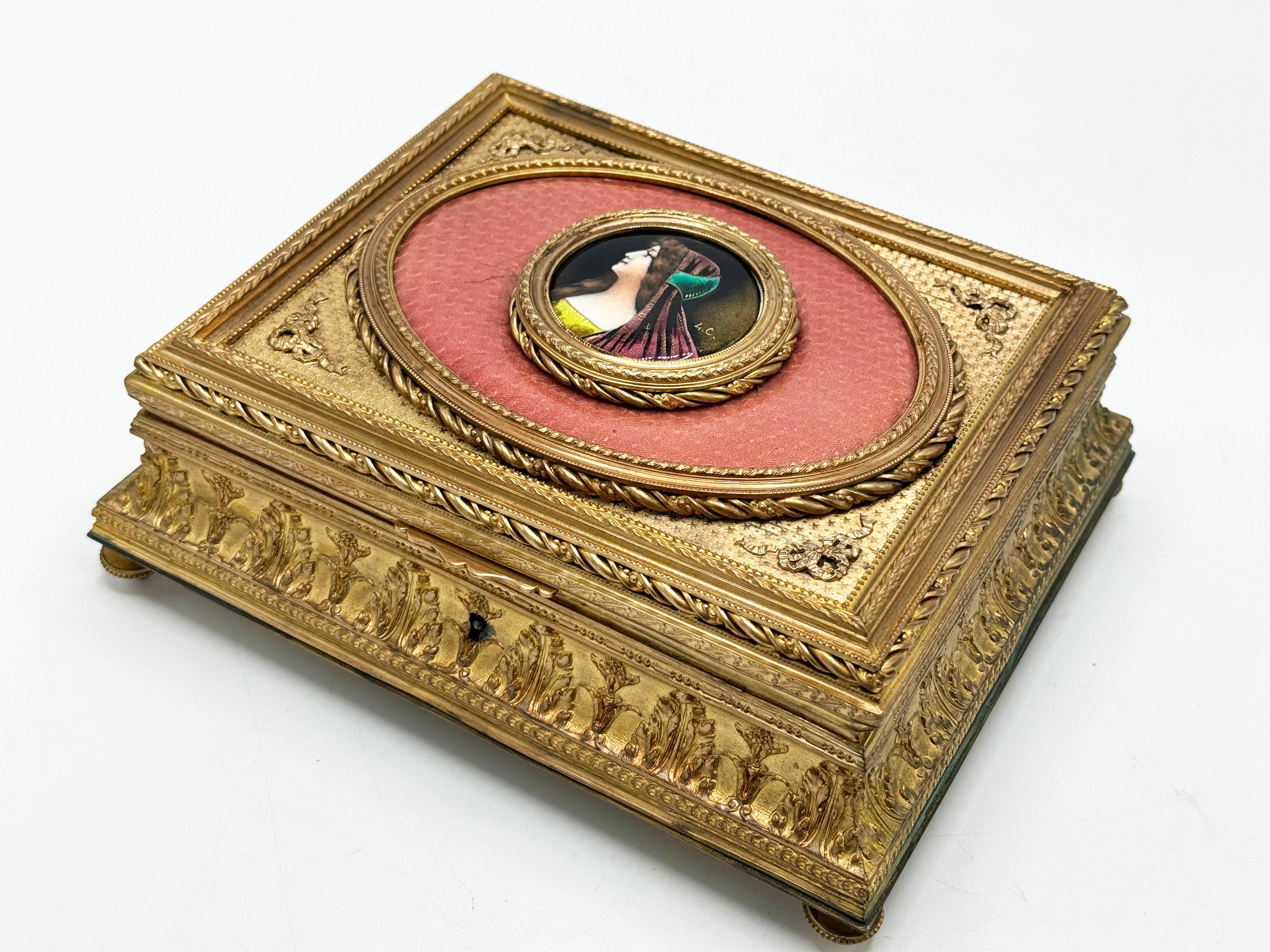 19th C. French Charming Bronze Jewelry Box with Limoges enamel
Made in france

This Beautiful bronze jewelry box with delicately carved frames, and in the center with a wonderful portrait in limoges enamel found in excellent conditions! has a
