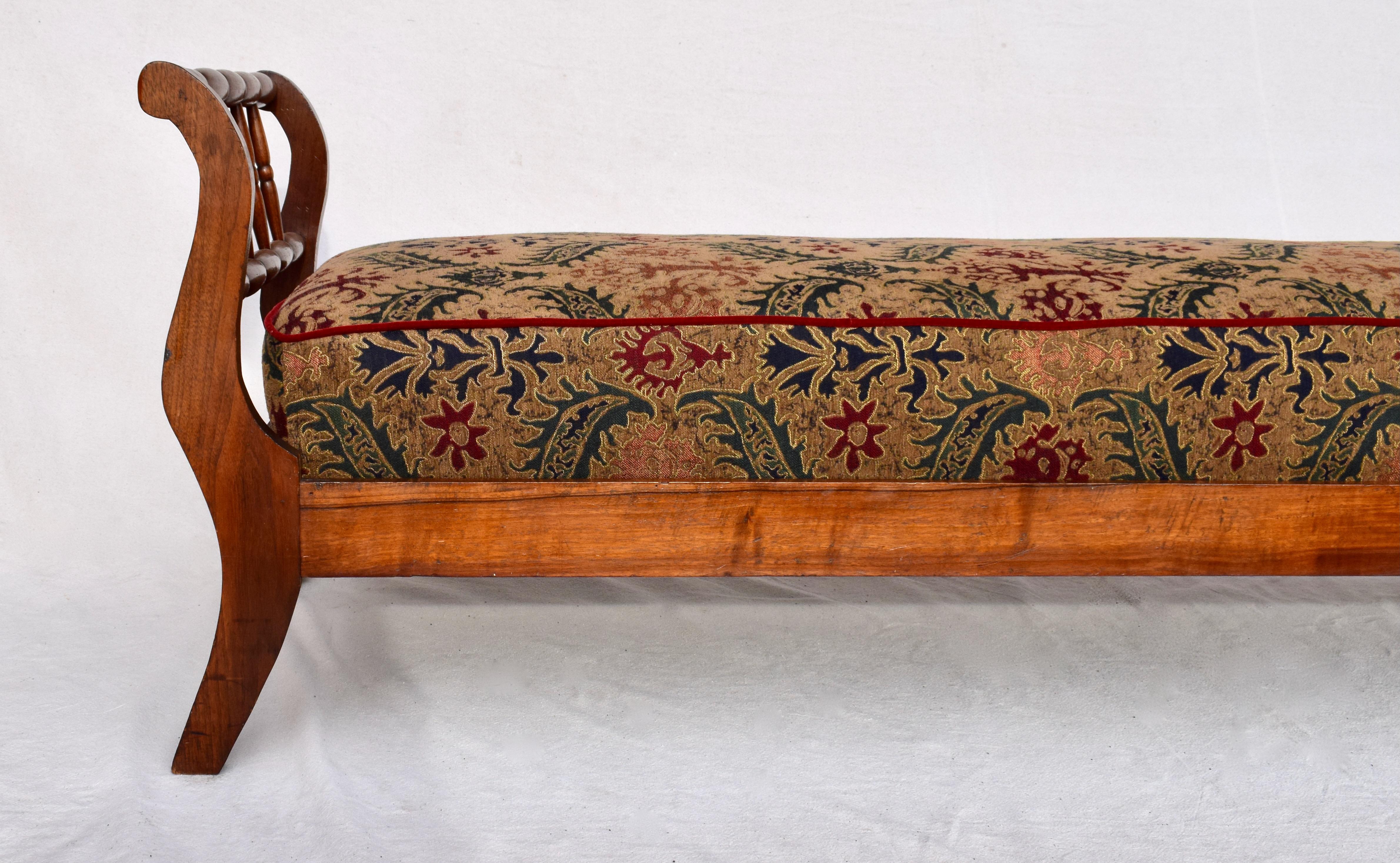 19th century Country Regency Mahogany daybed consisting of clever four piece frame having hand turnings & curvaceous scroll arms terminating on delightfully splayed legs with removable side rails. The removable spring constructed cushion is newly