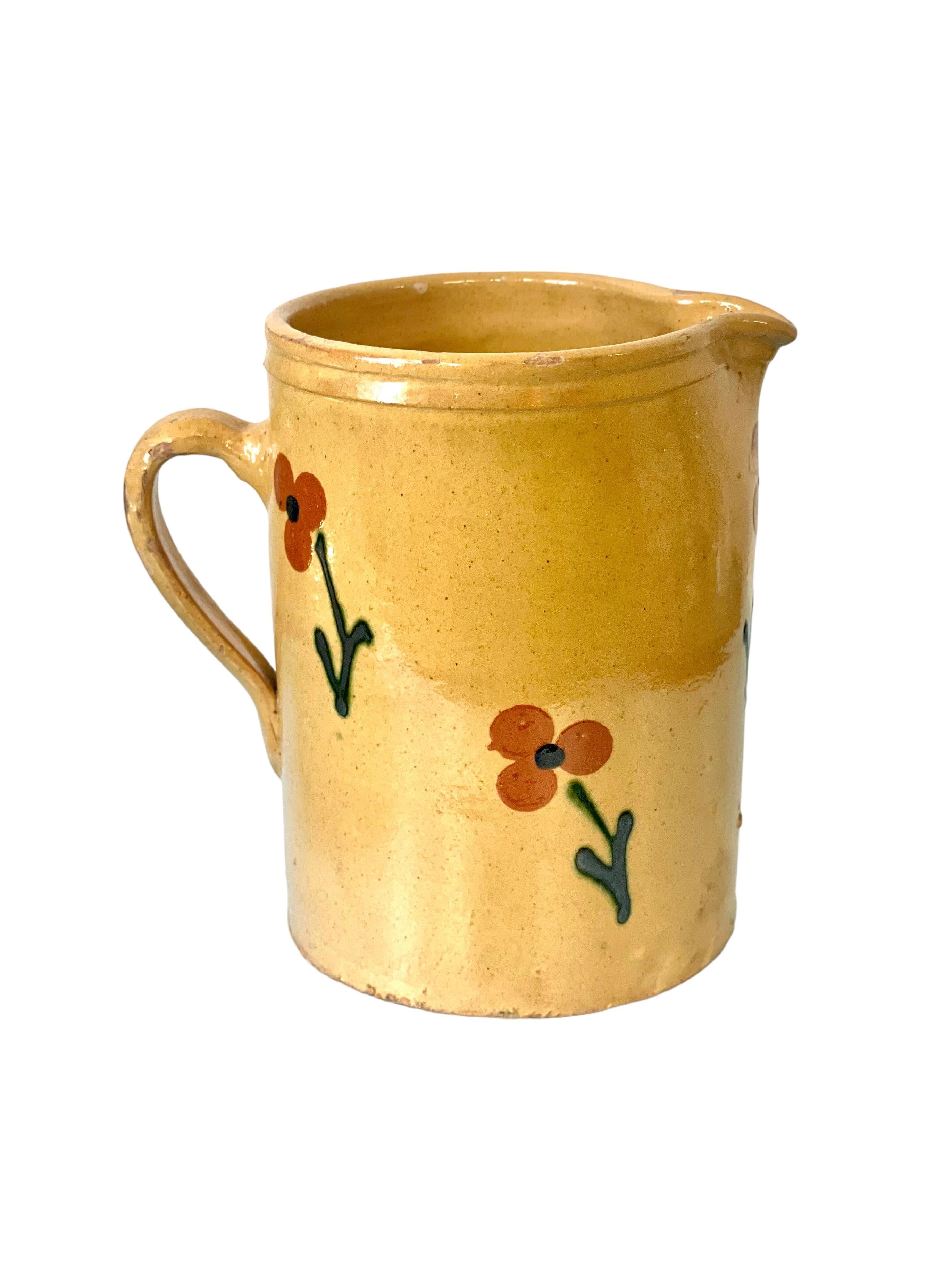 Rustic 19th C. French Cream Glazed Terracotta Water Pitcher with Flowers For Sale