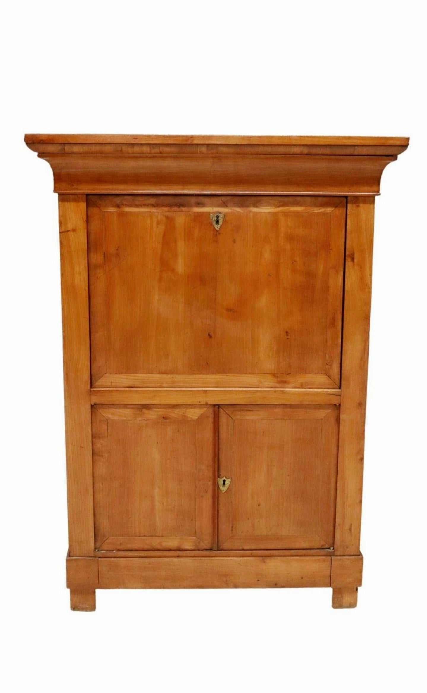 A Louis Philippe period (1830–1848) fruitwood secretaire abattant fall front desk.

Born in France in the mid-19th century, hand-crafted of rich solid fruitwood with warm wood tones, subtle grain detail, and nicely aged mellow patina over the