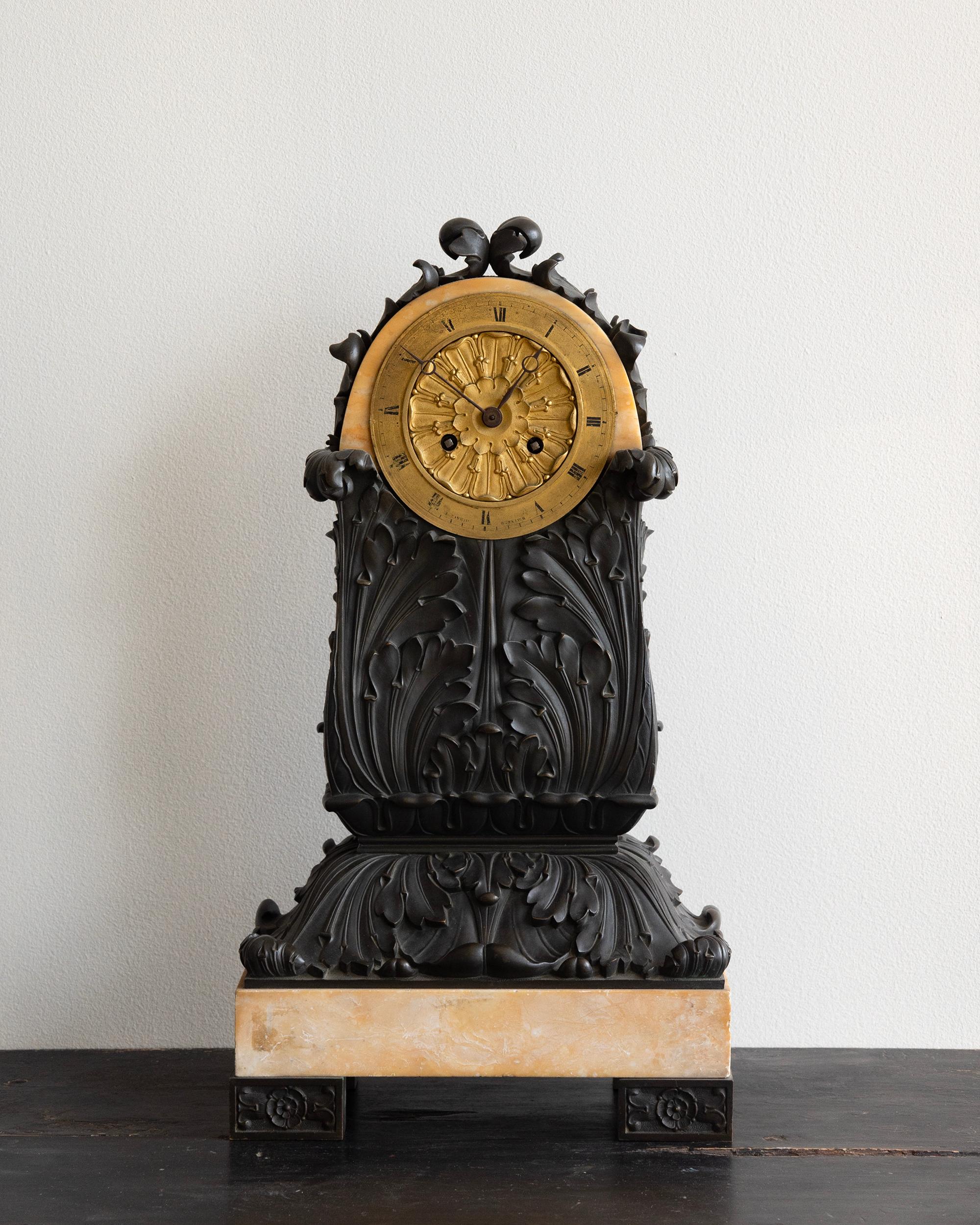 19th century French, Charles X bronze, brass and sienna marble table clock from the Empire period. Signed Ravrio Bronzier, ca 1820 France. 
