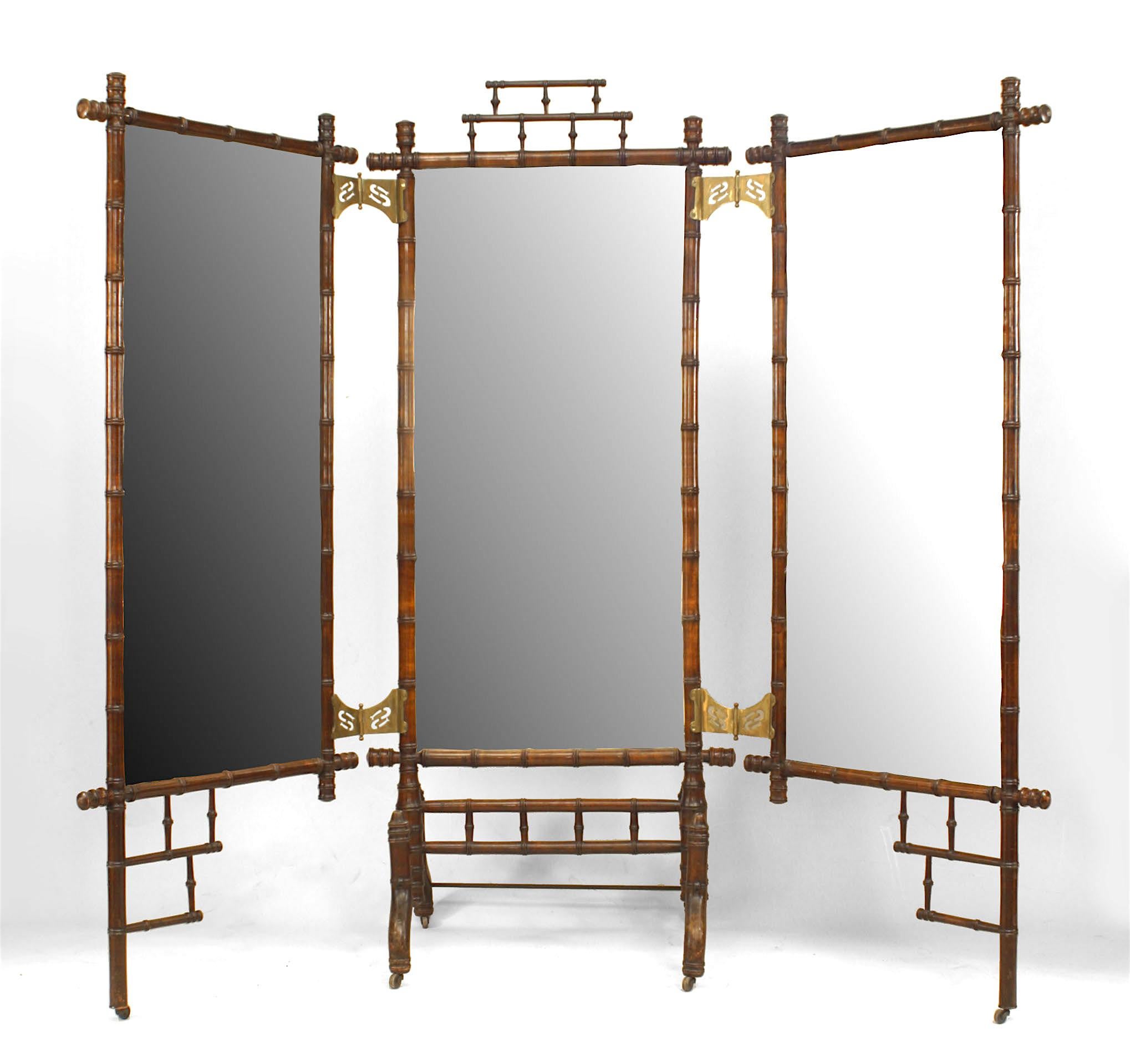 French Victorian faux bamboo (maple) three-fold (triptych) cheval mirror with open design top and bottom with brass hinges.
