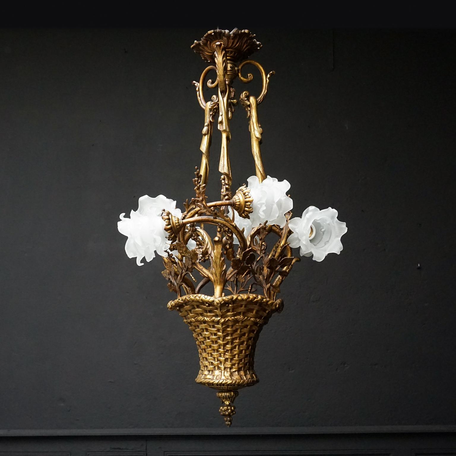 19th century romantic French basket-shaped gilt bronze ceiling 'Marie-Antoinette' luster with six flower lights.
From the basket small leave branches and six larges 'branches' stick out, these thicker branches are crowned by glass roses.

The