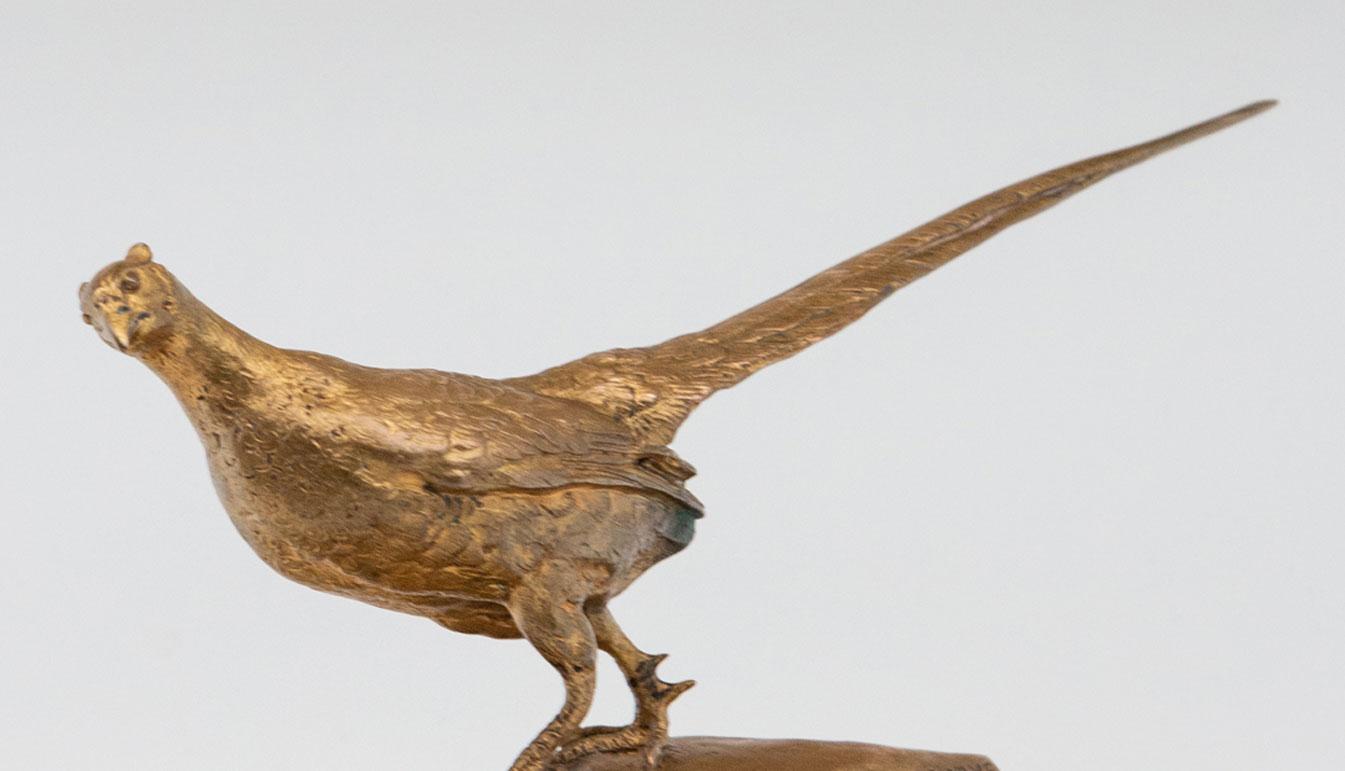 Bronze sculpture of a Pheasant on red marble. After Antoine Louis Barye, Signed F. Barbedienne.