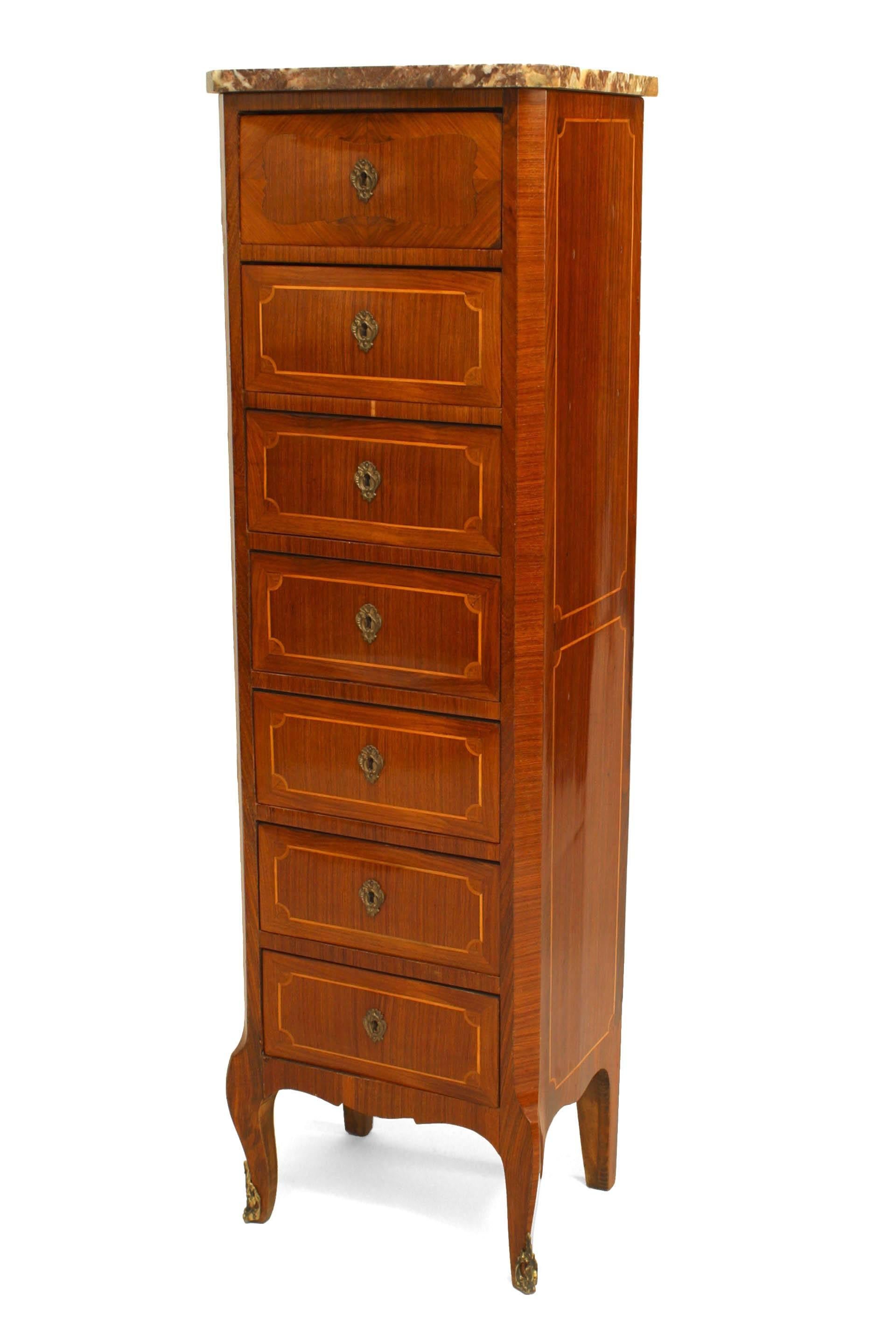 French Victorian narrow walnut and inlaid semanier, 7 drawer chest with a marble top.
