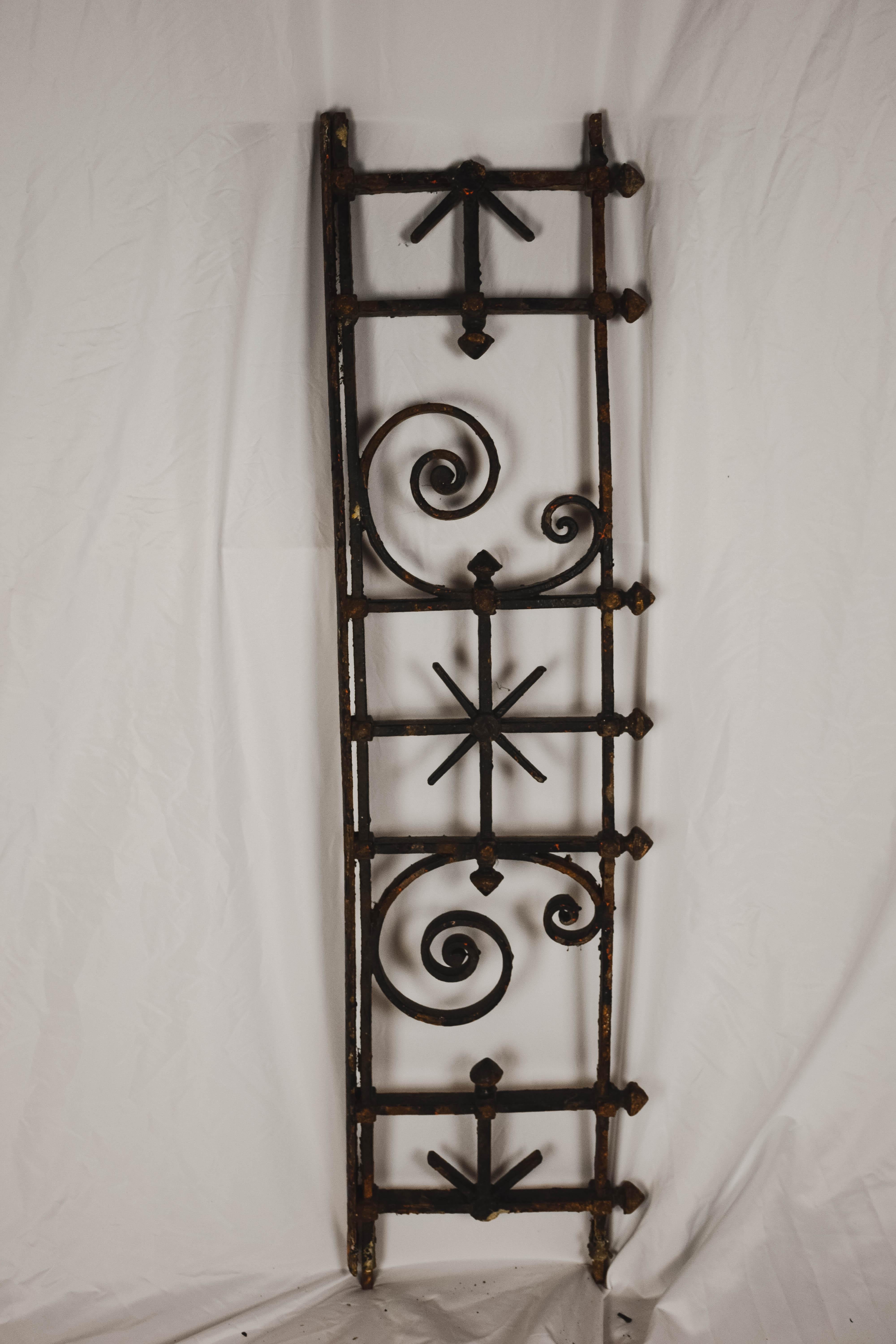 This beautiful handcrafted 19th century French iron architectural fragment was probably once a piece from a balcony or fence. Would be wonderful repurposed as a console or simply hanging on the wall.