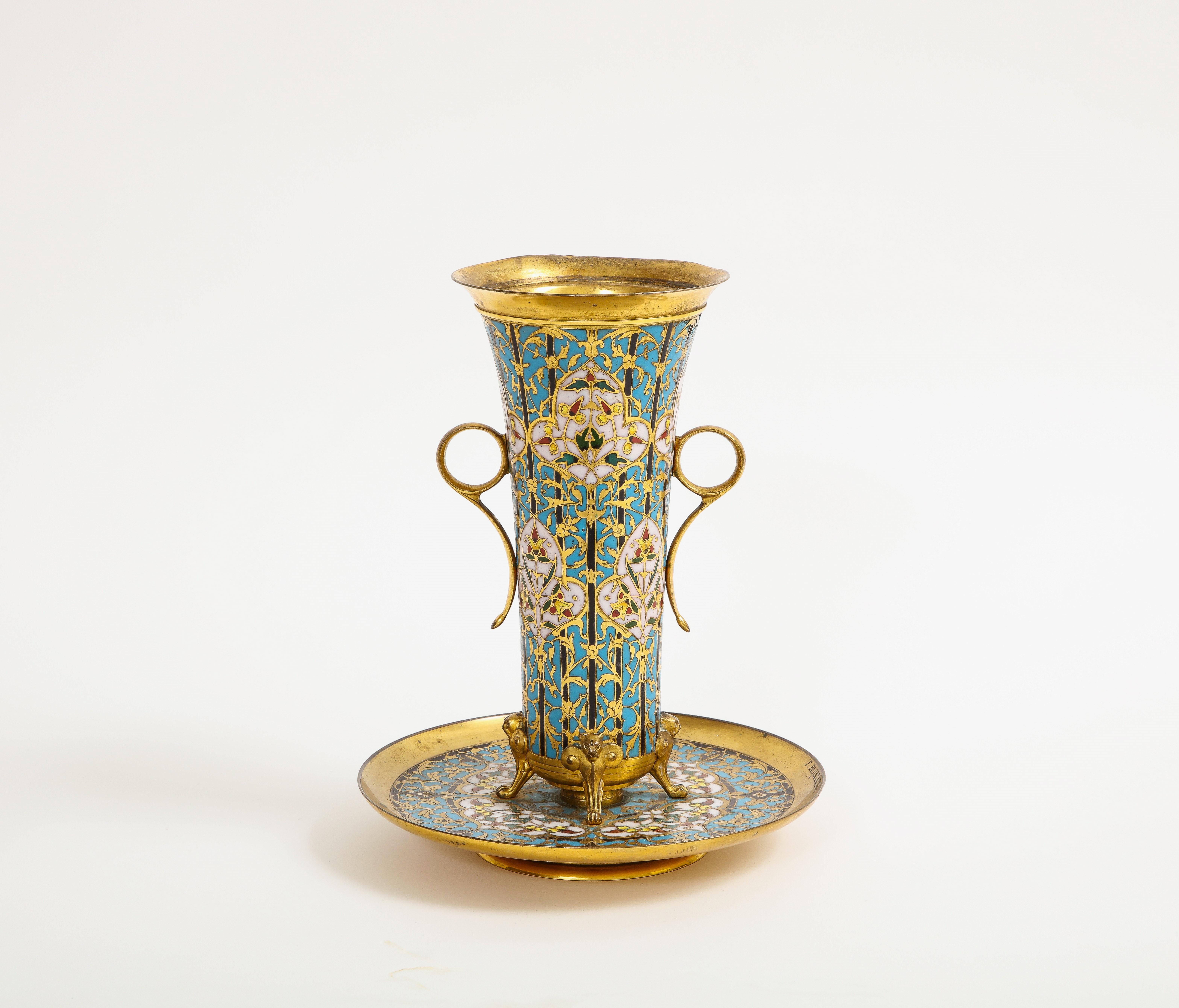 A Fantastic 19th century French Islamic/Orientalist Style Champleve Enamel Vase and Underplate, Signed F. Barbedienne. The wide-mouthed vase terminates down a narrowing body and is mounted on four ormolu lions-paw feet. The body of the vase is