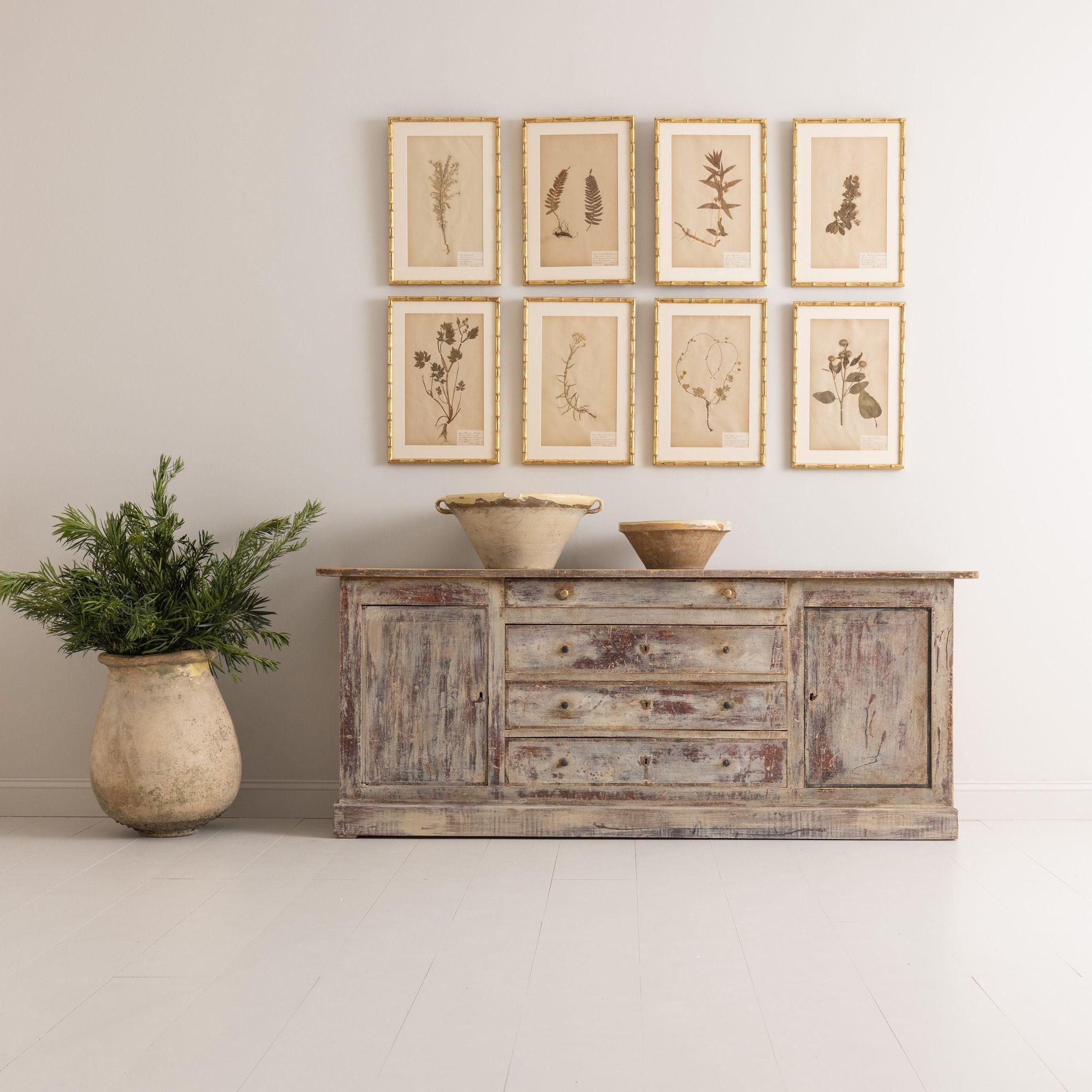 A 19th century French Louis Philippe enfilade found in Provence. This beautiful two-door and four drawer sideboard or buffet has been hand dry-scraped down to the original gesso, circa 1830. Found in Provence. This is a great piece with plenty of