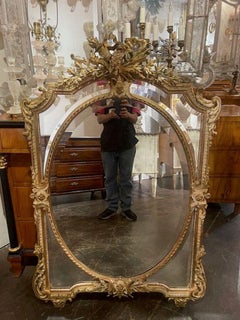 19. Jahrhundert. Louis XV.-Spiegel aus vergoldetem Holz