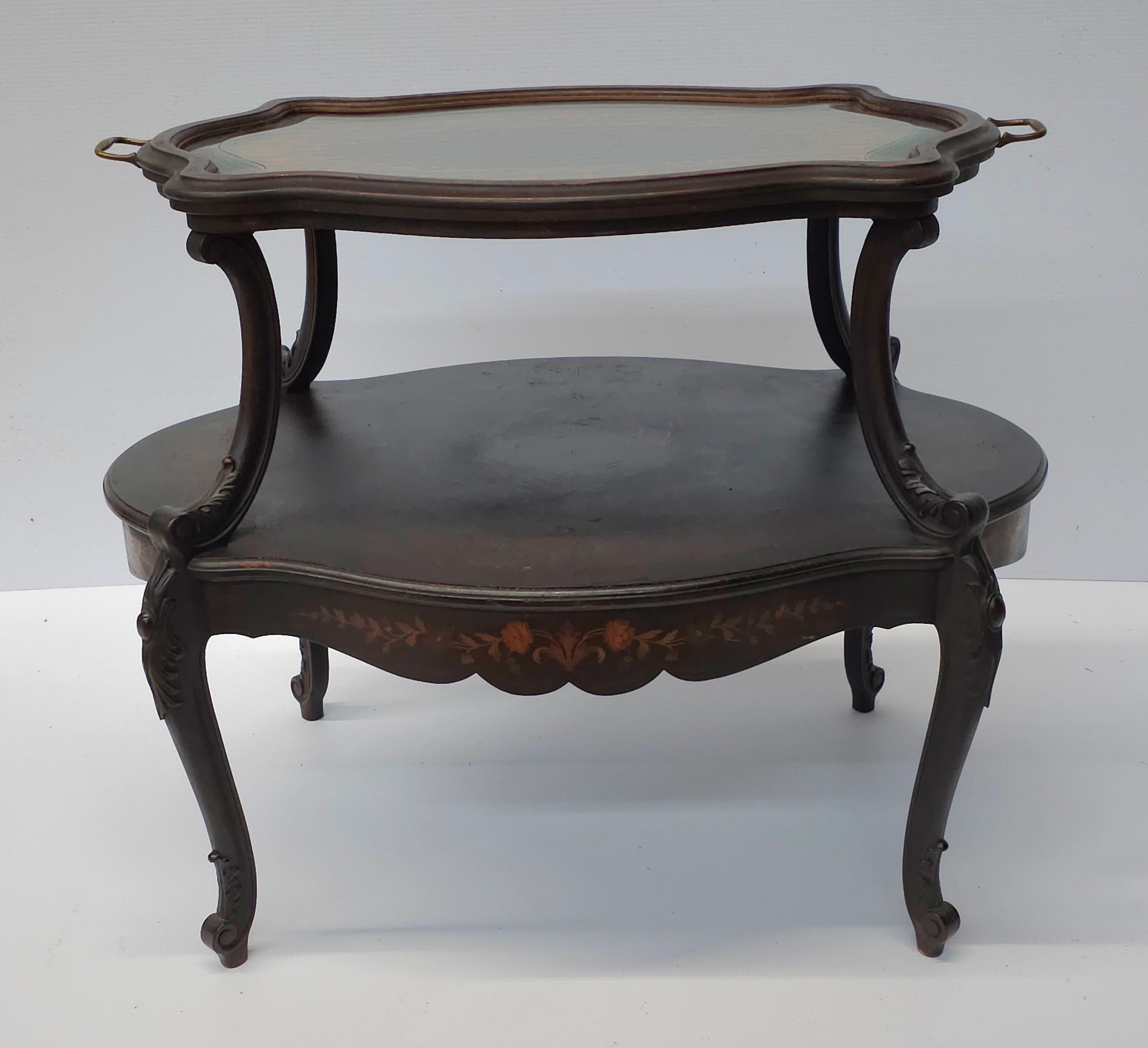 19th Century French Louis XV Marquetry Tea Table with serving tray top Attributed to Francois Linke
 Inlaid crackle finish top some Faded inlays on lower tier as pictured.
Measures 36