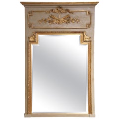 A.I.C.C. Miroir de Trumeau peint et doré avec verre biseauté, 19ème C.
