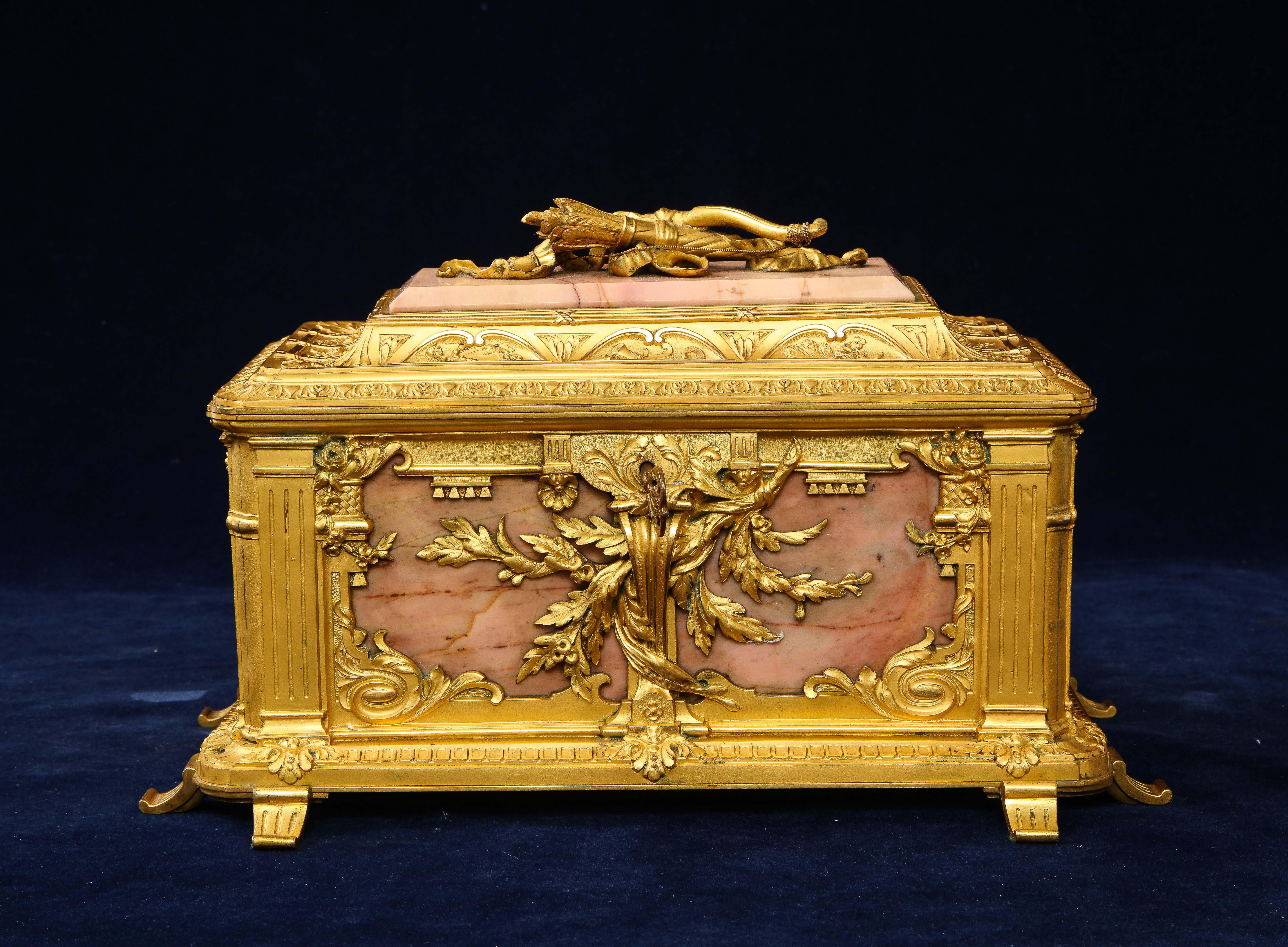 A fantastic quality French 19th century dore bronze mounted and pink marble jewelry casket/jewelry box. The quality of the bronze mounts is truly magnificent; each mount is beautifully hand-chased, hand-chiseled, matted and burnished with incredible