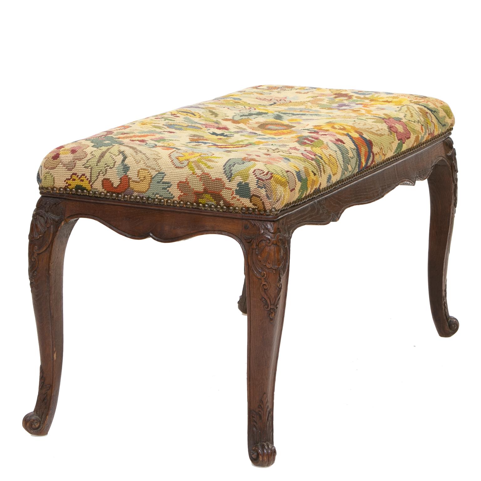19th century French needlepoint tapestry bench

This bench is made of oakwood and from the Normandy region of France. Made in the late 19th century. A fantastic needlepoint covering applied to the seat and is in very nice condition. There is an