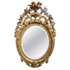 19th c. French Ornately Carved Giltwood Oval Mirror