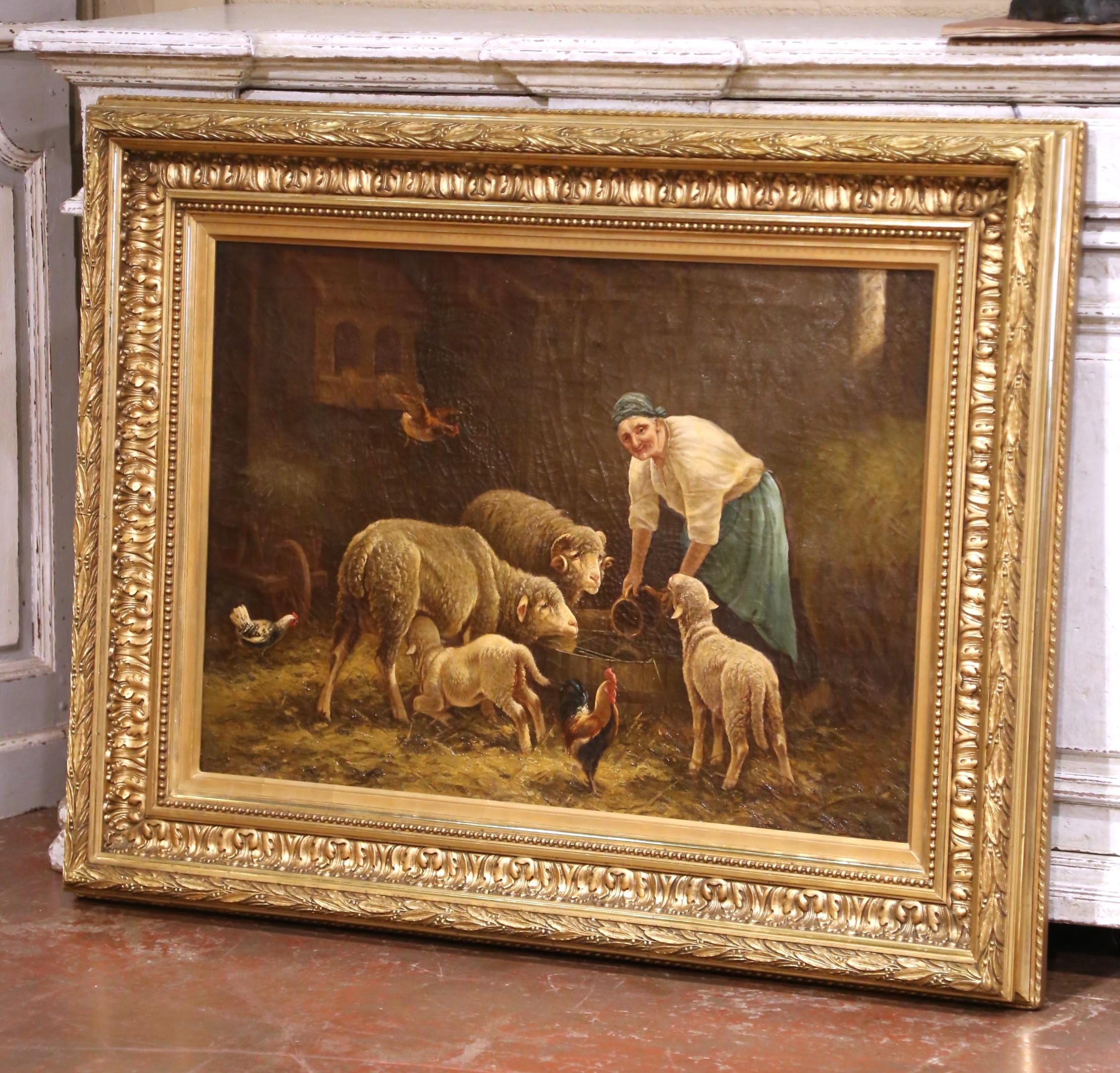 This impressive oil on canvas, painted in France circa 1870, captures a lively farmyard scene where an elderly woman tends to sheep and lambs while roosters and hens animate the foreground. Signed lower right by Charles Hélygouët, a 19th-century