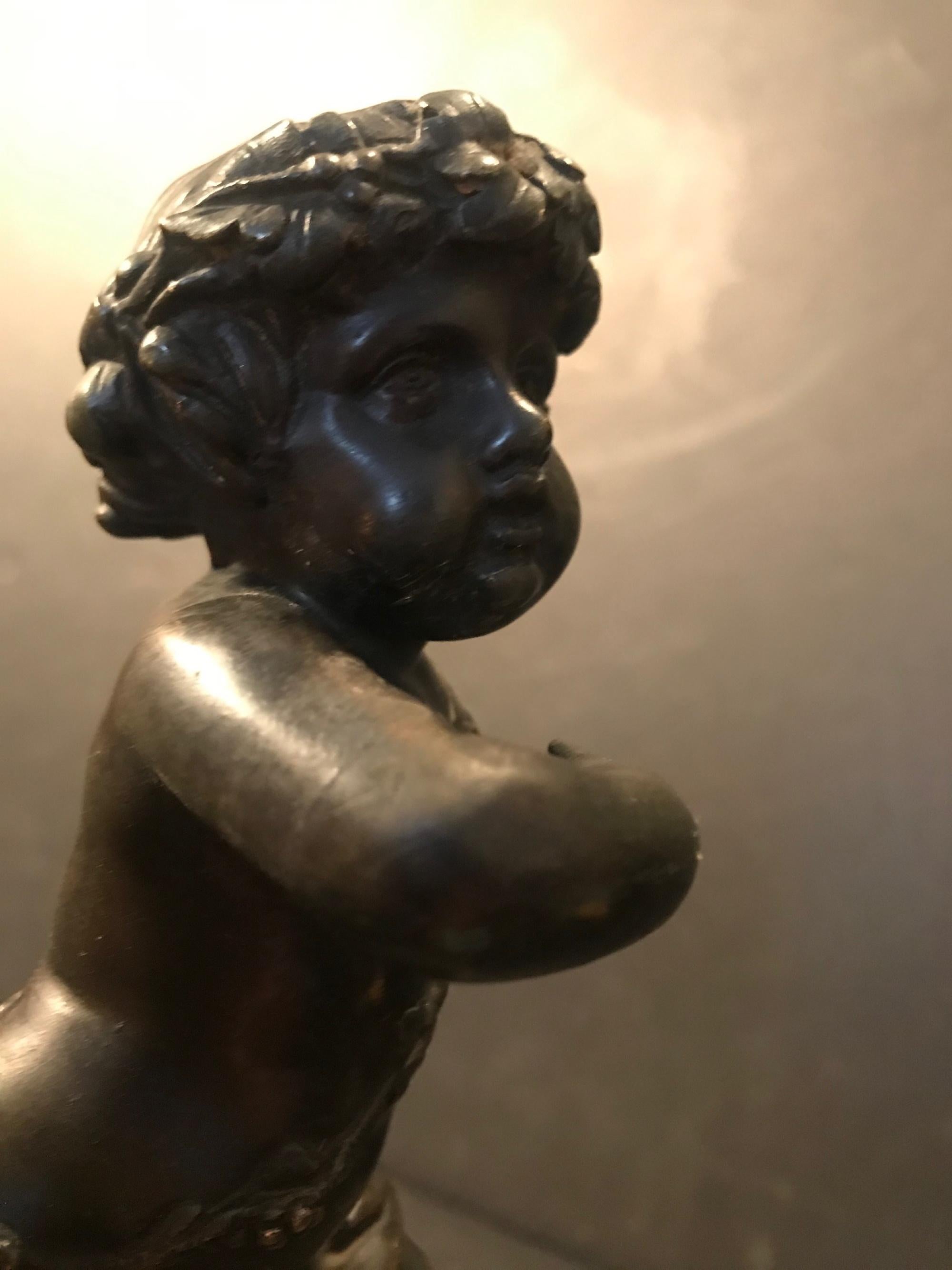 sculpture française du 19ème siècle en bronze patiné représentant un enfant faune satyre d'après Clodion en vente 1