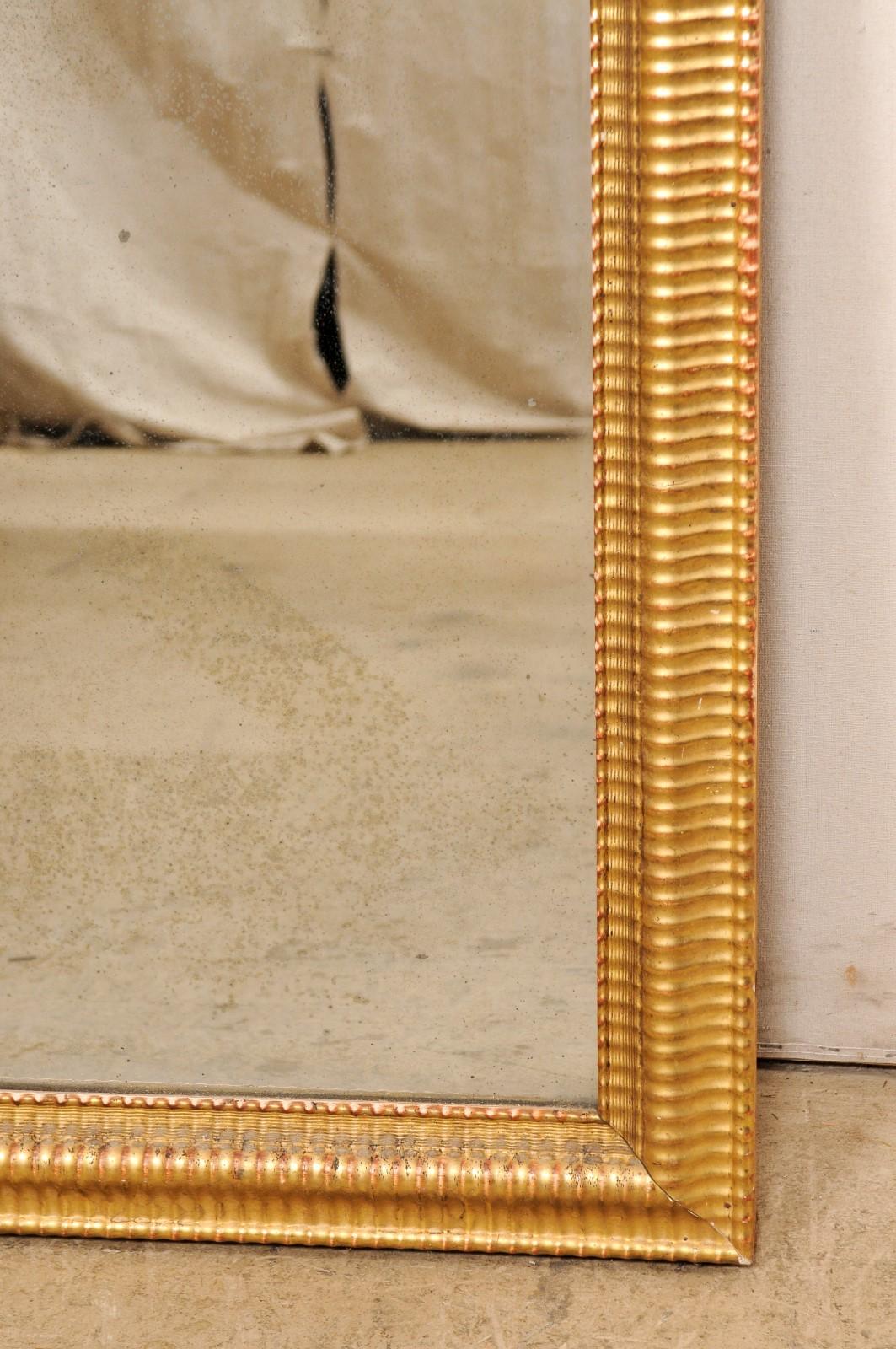 Französischer rechteckiger, geschnitzter und vergoldeter Holzspiegel aus dem 19. im Angebot 3