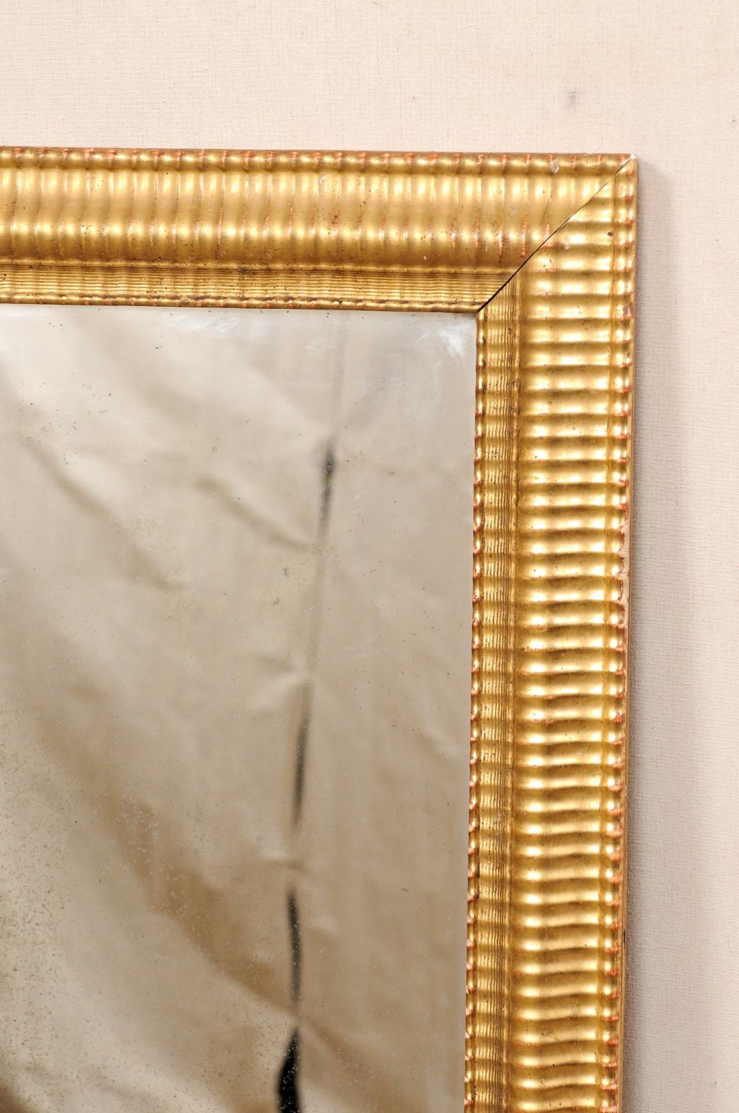 Französischer rechteckiger, geschnitzter und vergoldeter Holzspiegel aus dem 19. im Angebot 4