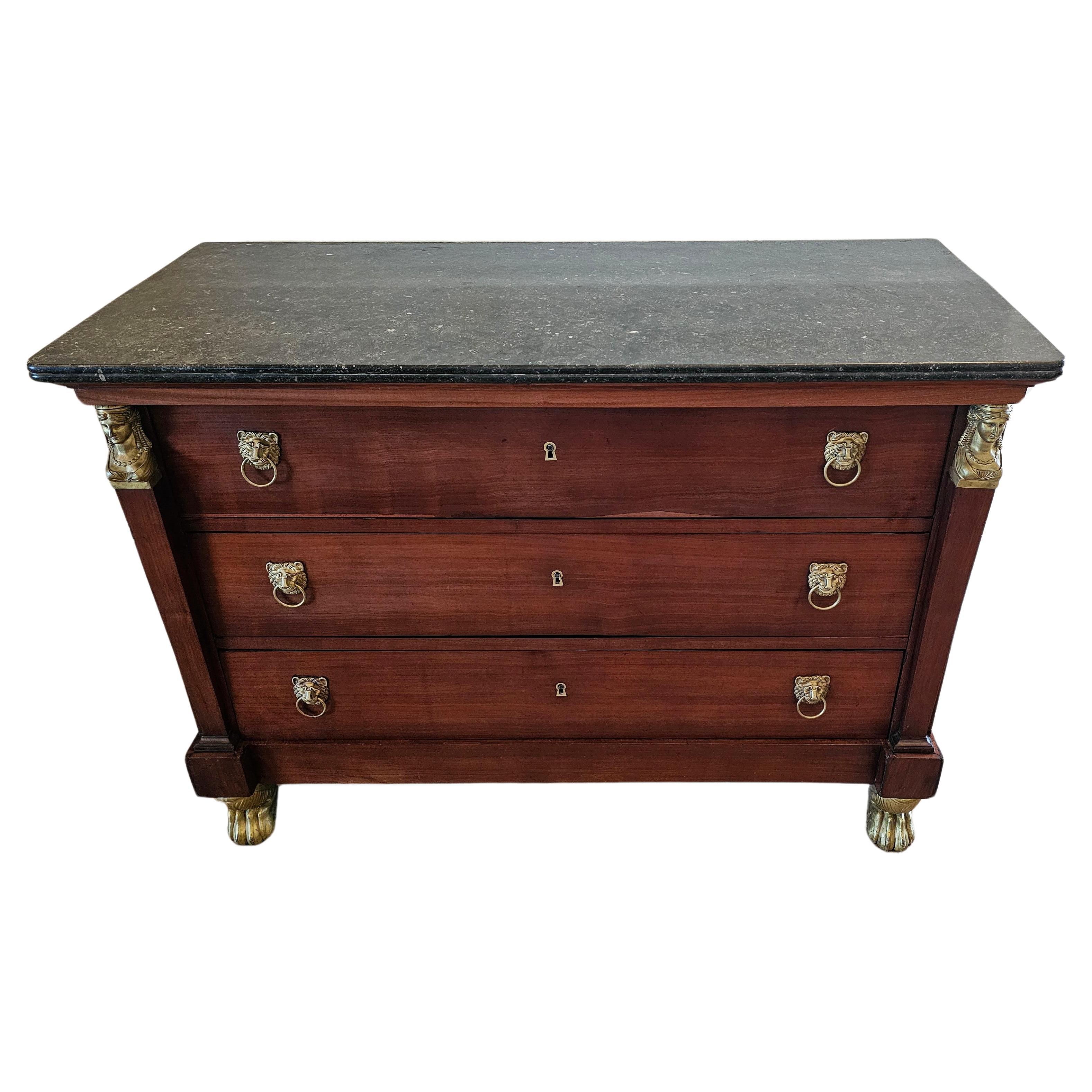 A striking French Empire style mahogany chest of drawers commode with warm rich patina. circa 1820

Born in France during the early 19th century Restauration Period (1815-1830), hand-crafted of mahogany with oak secondary, having a rectangular