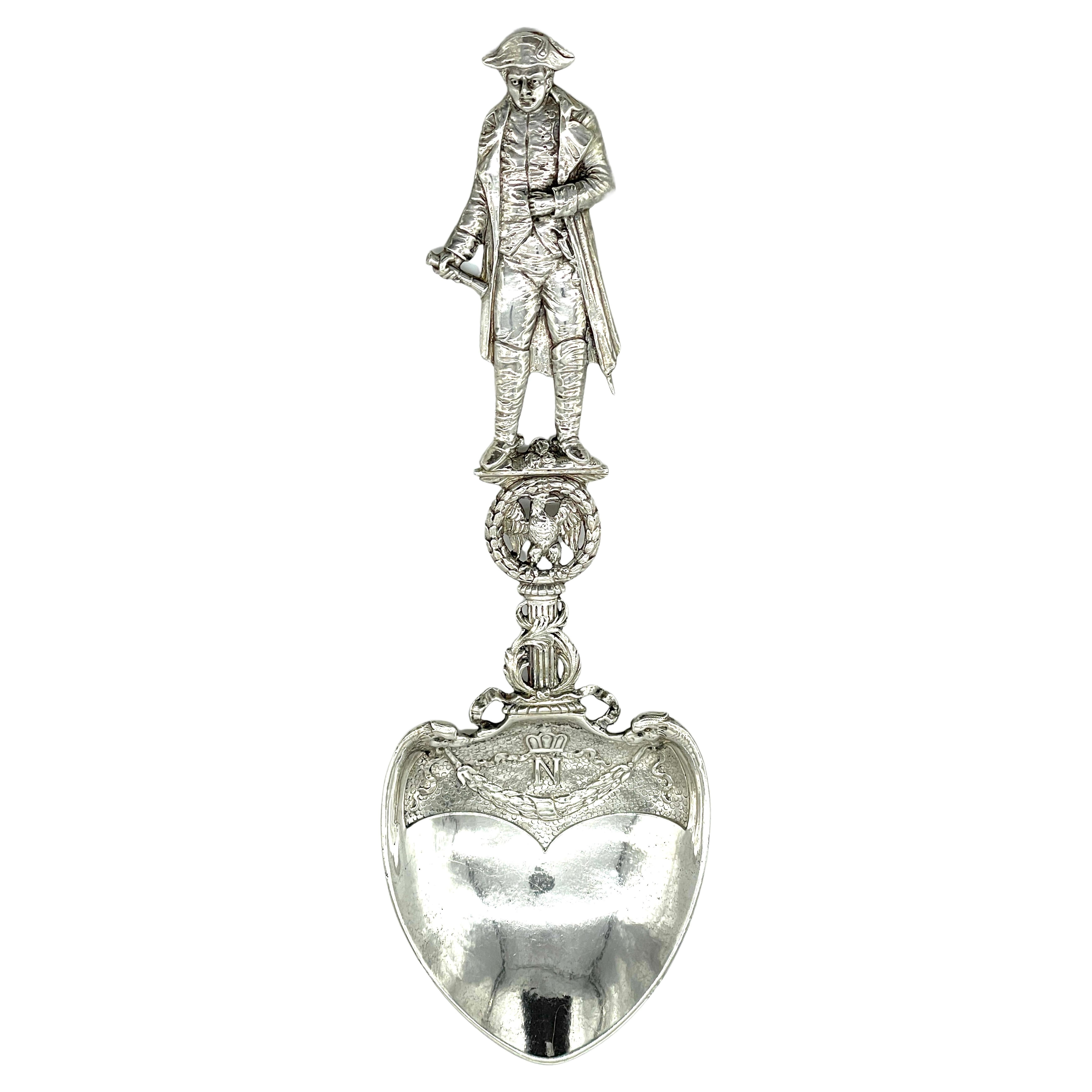 19th Century French Silver Commemorative 3-Dimensional Napoleon Portrait Spoon 
Unmarked, France, 19th Century 

A remarkable 19th-century French silver commemorative spoon featuring a stunning 3-dimensional portrait of Napoleon Bonaparte. Cast with