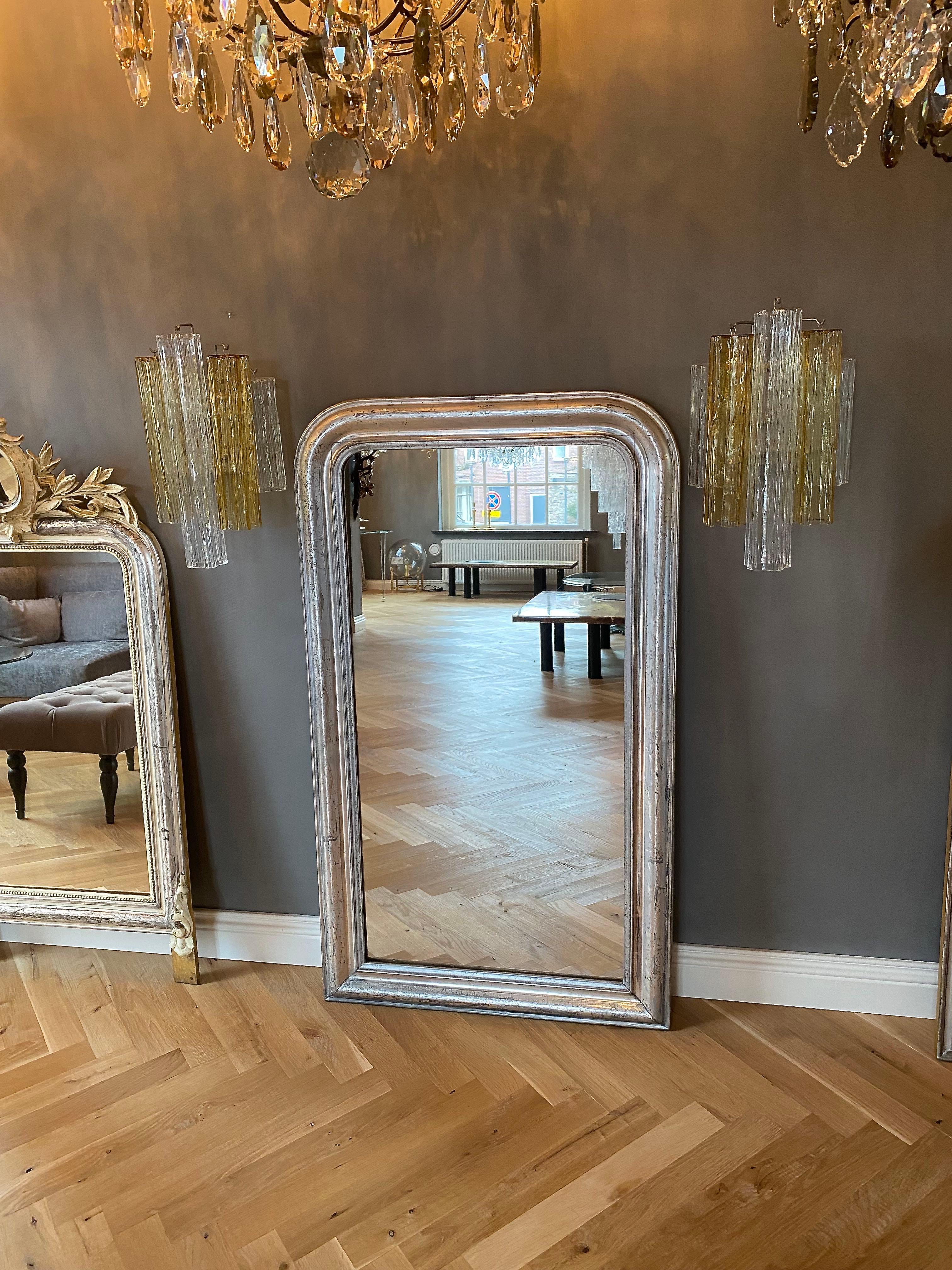 A very pretty antique French mirror Louis-Philippe with its original antique glass and silver leaf gilding.
The frame is etched with foliate motifs.
The mirror has an original wooden back.
The mirror is beautiful antique condition!
