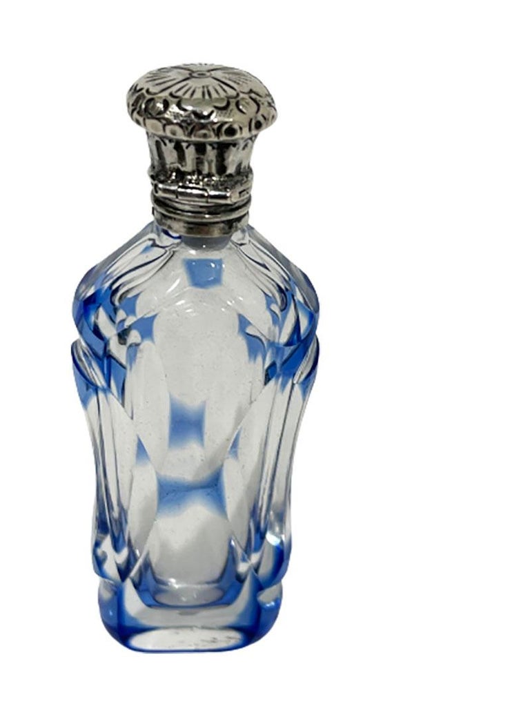 https://a.1stdibscdn.com/19th-c-french-small-crystal-clear-and-blue-overlay-scent-bottle-with-silver-cap-for-sale-picture-3/f_34651/f_234964321619185734090/M851_Scent_bottle_3_master.jpg?width=768